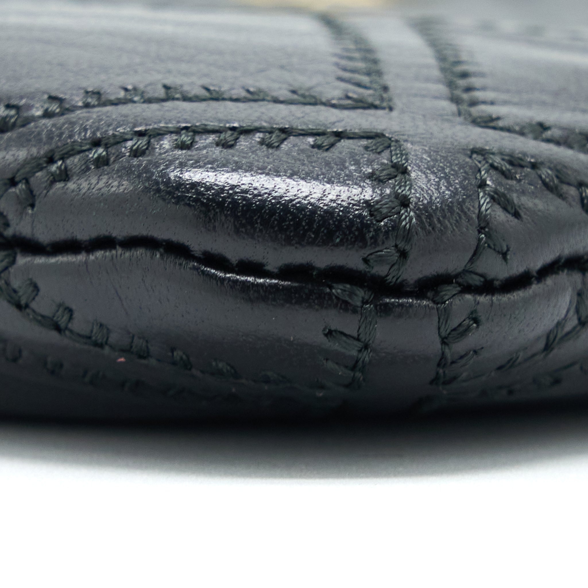 chanel-quilted-pouch-with-tassel-black-lghw