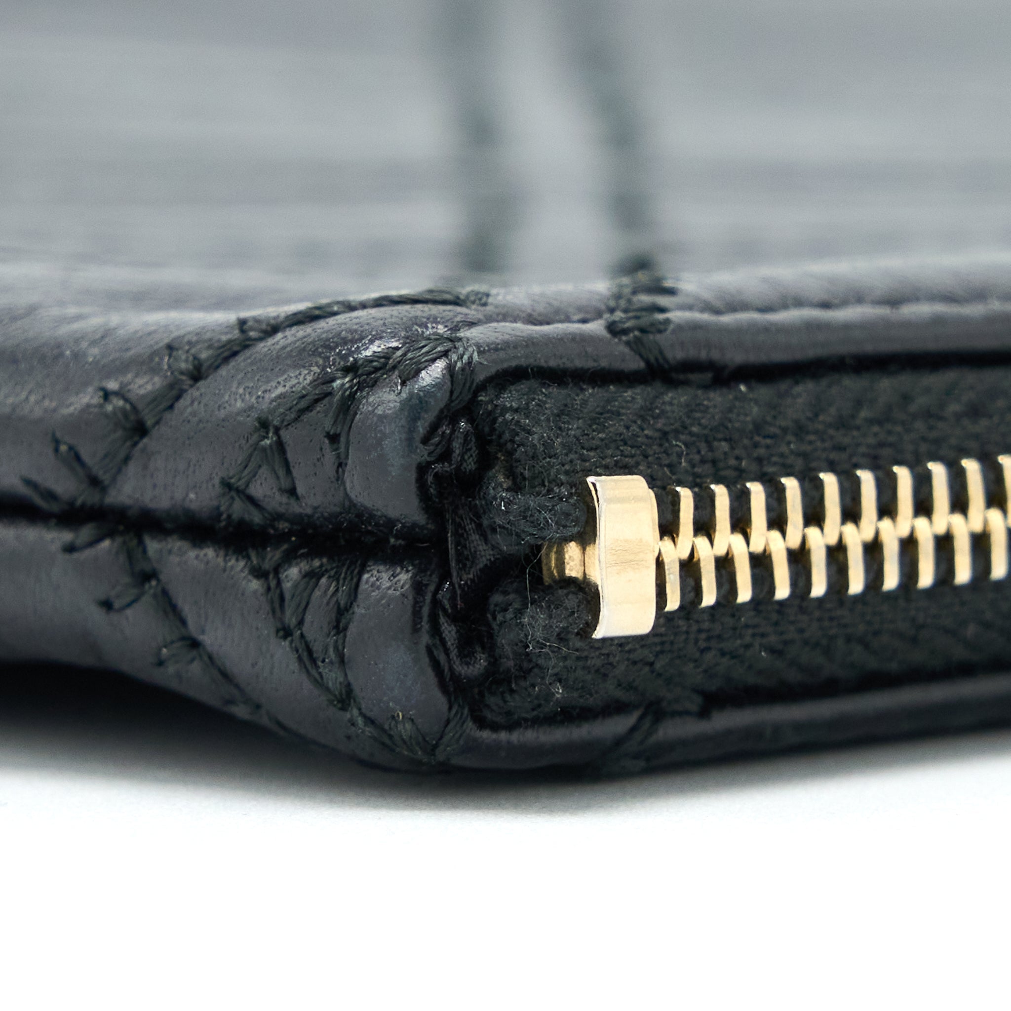 chanel-quilted-pouch-with-tassel-black-lghw