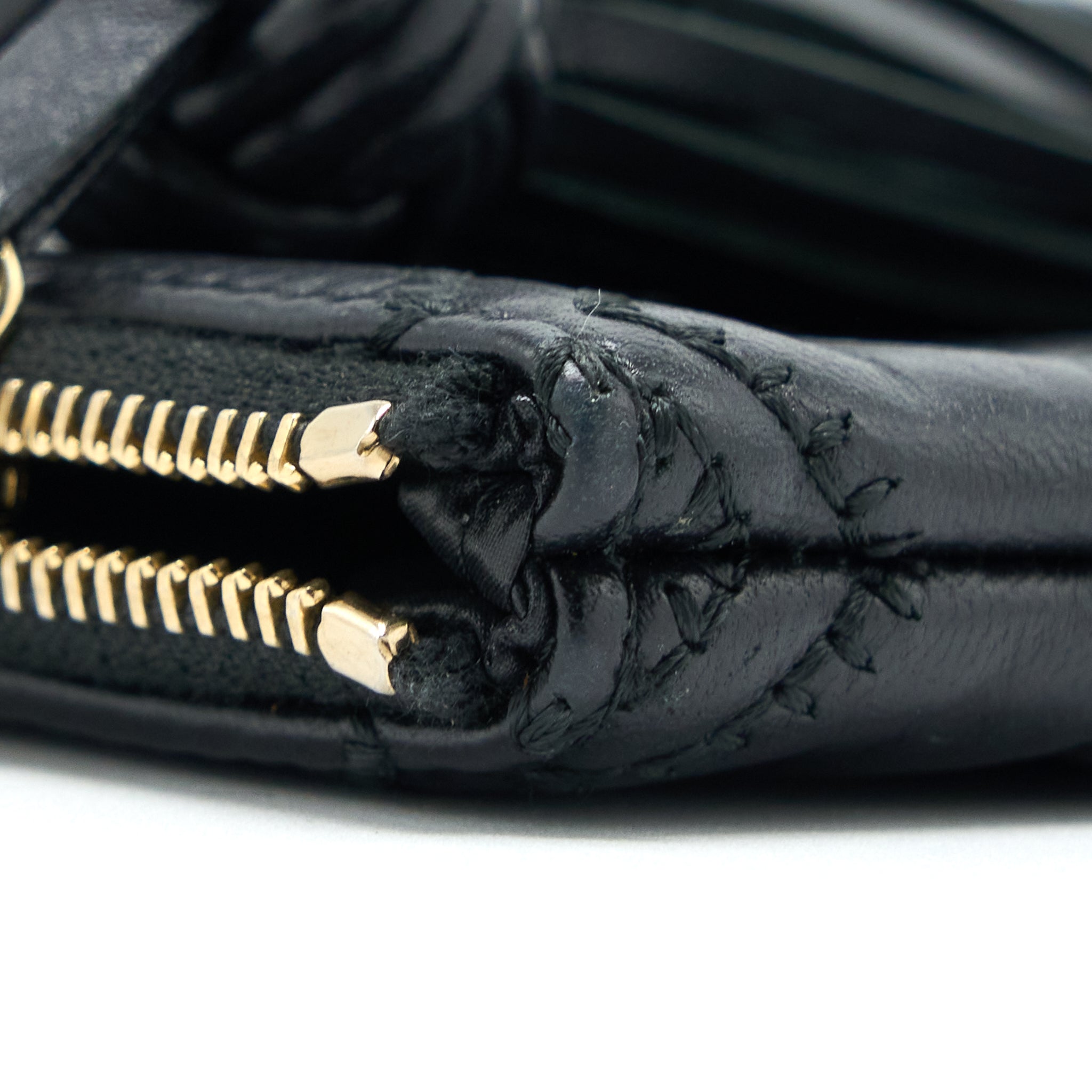 chanel-quilted-pouch-with-tassel-black-lghw