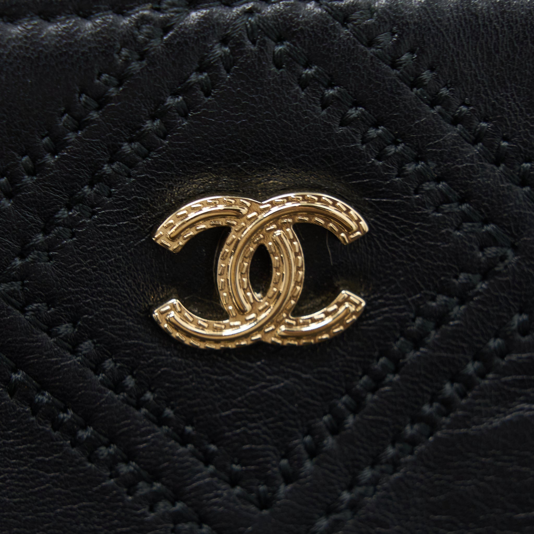 chanel-quilted-pouch-with-tassel-black-lghw