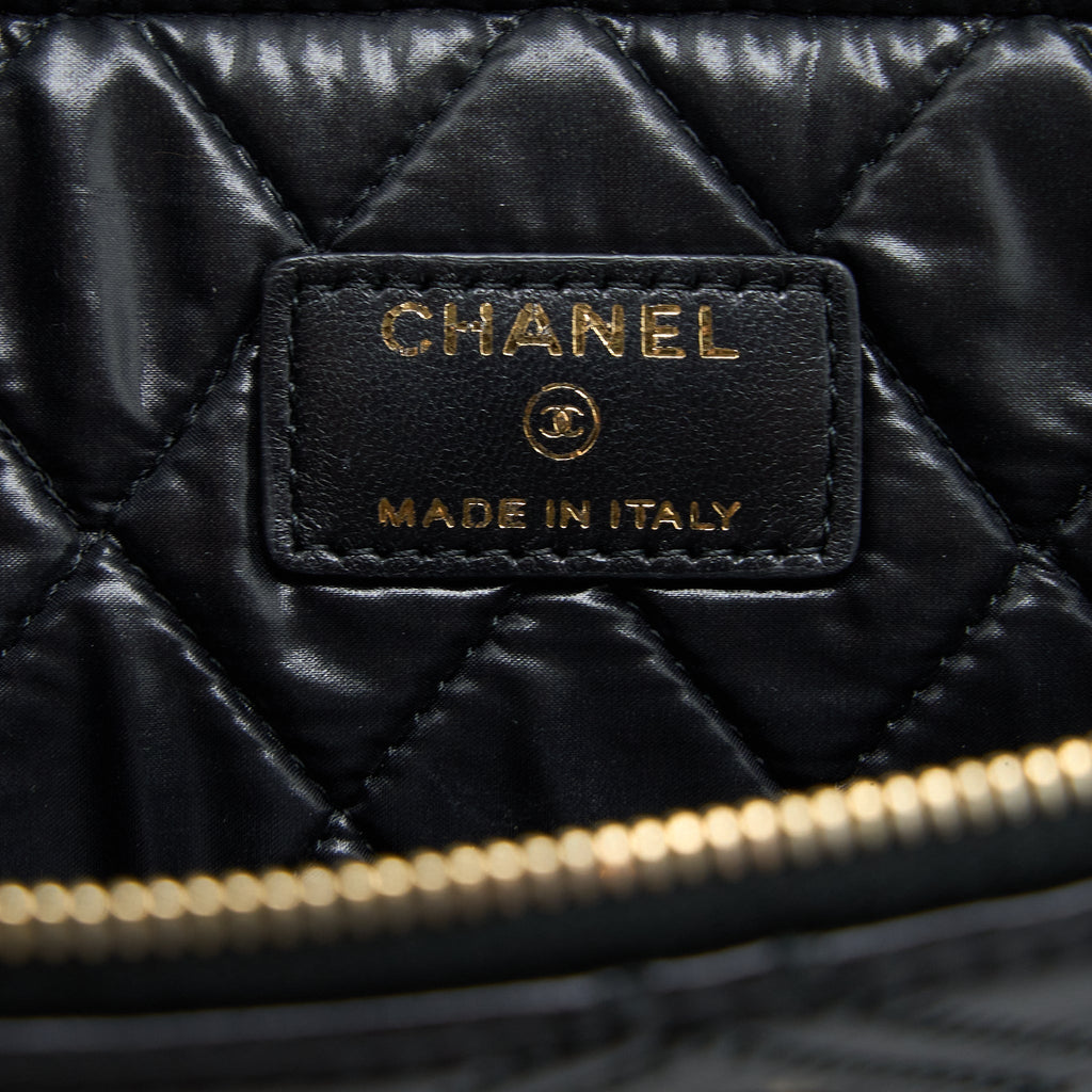 chanel-quilted-pouch-with-tassel-black-lghw