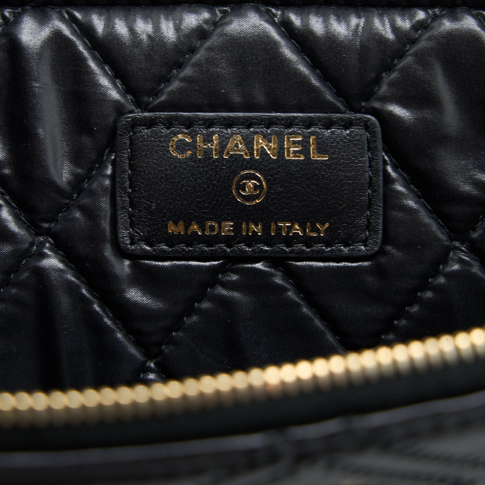 chanel-quilted-pouch-with-tassel-black-lghw
