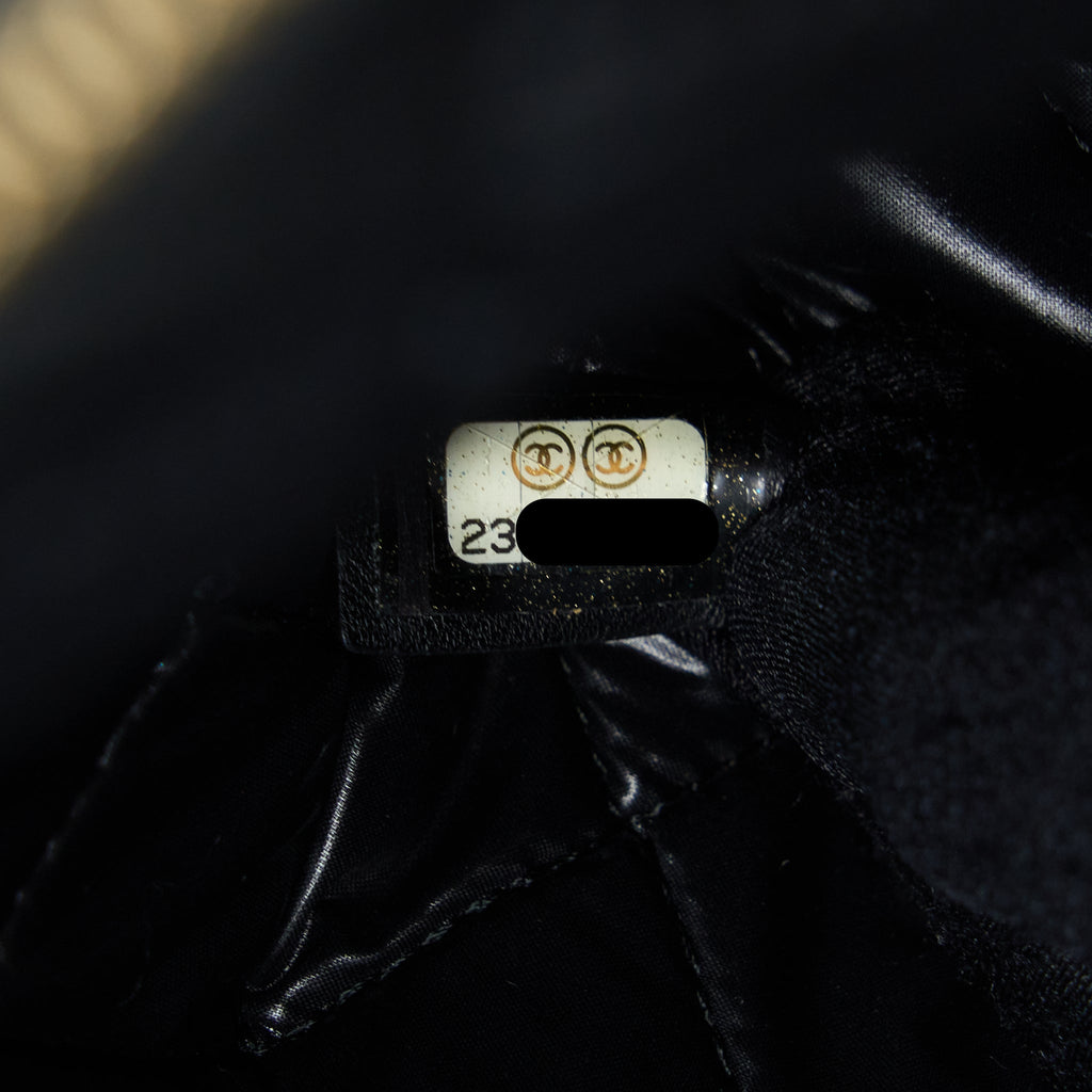 chanel-quilted-pouch-with-tassel-black-lghw