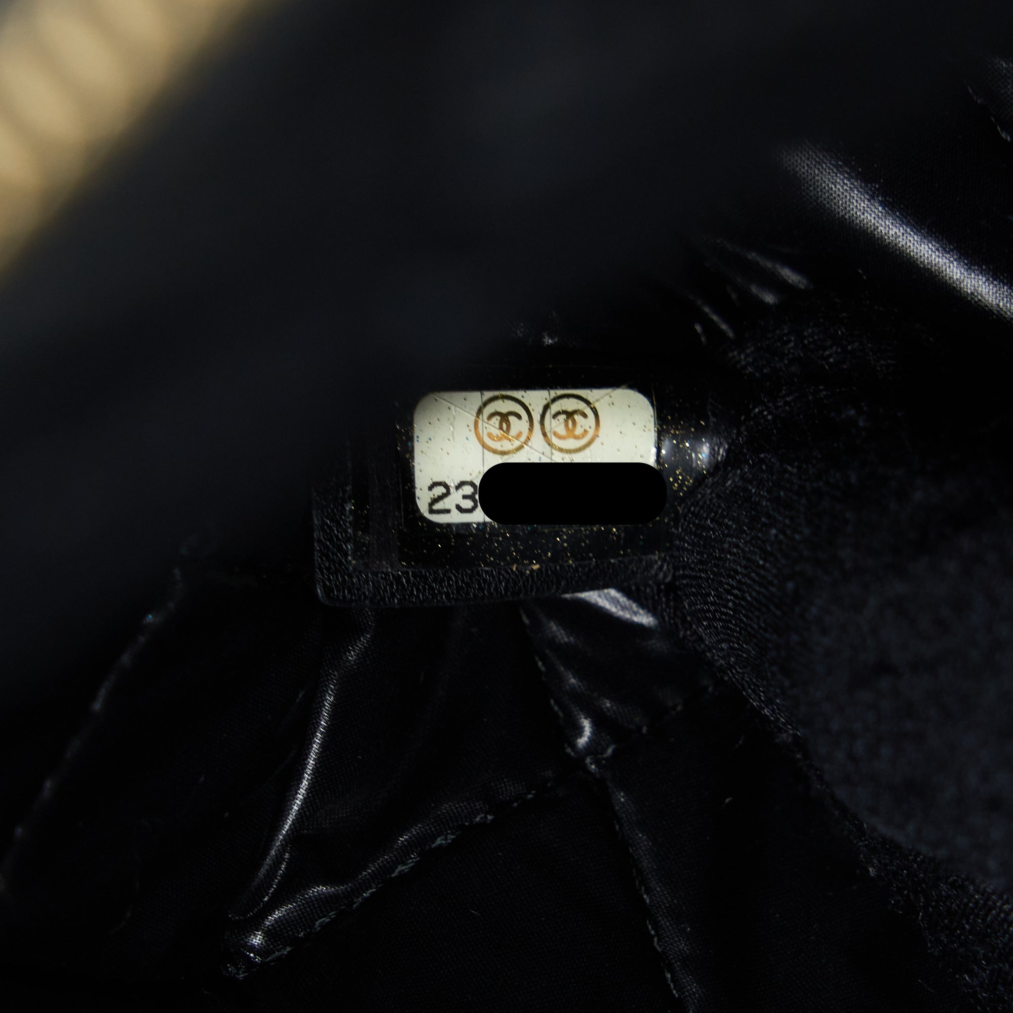 chanel-quilted-pouch-with-tassel-black-lghw