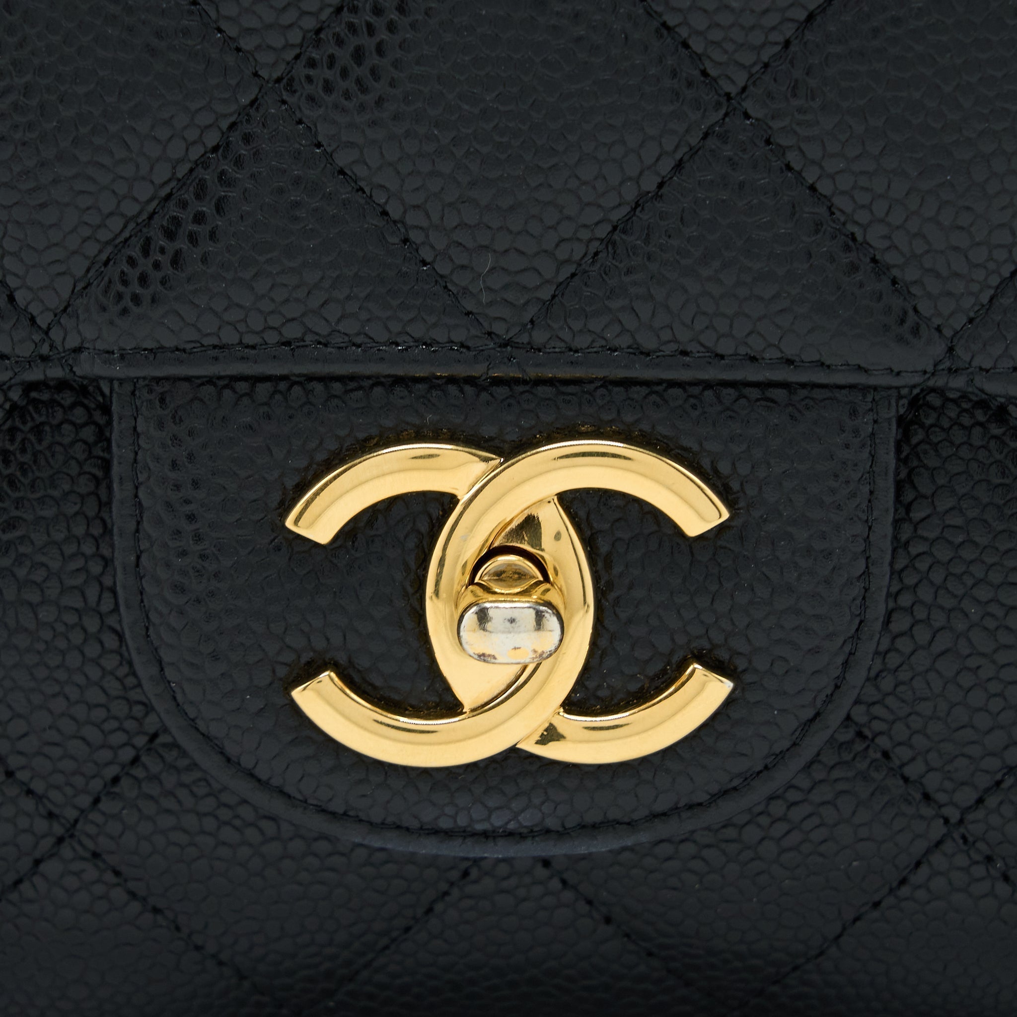 chanel-maxi-classic-double-flap-bag-caviar-black-ghw