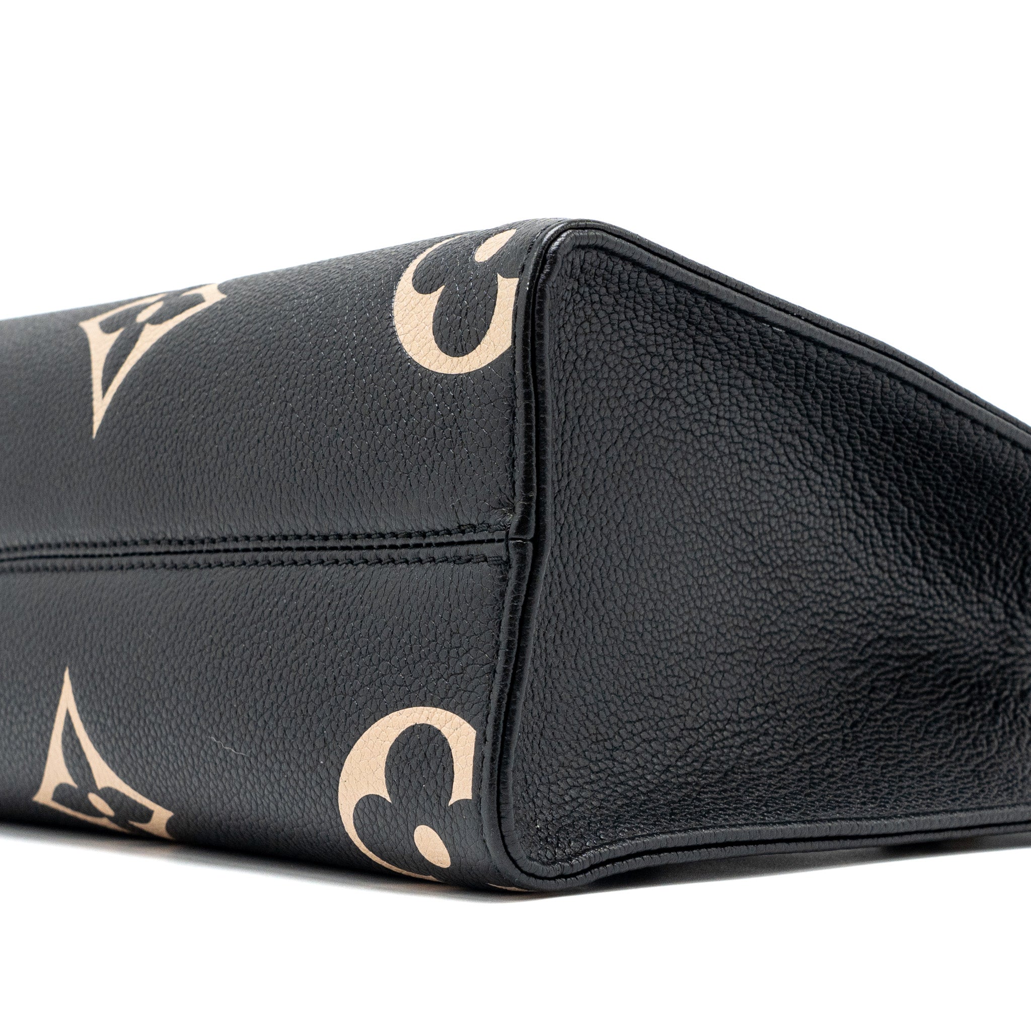 louis-vuitton-onthego-pm-bicolour-monogram-empreinte-leather-black-beige-ghw