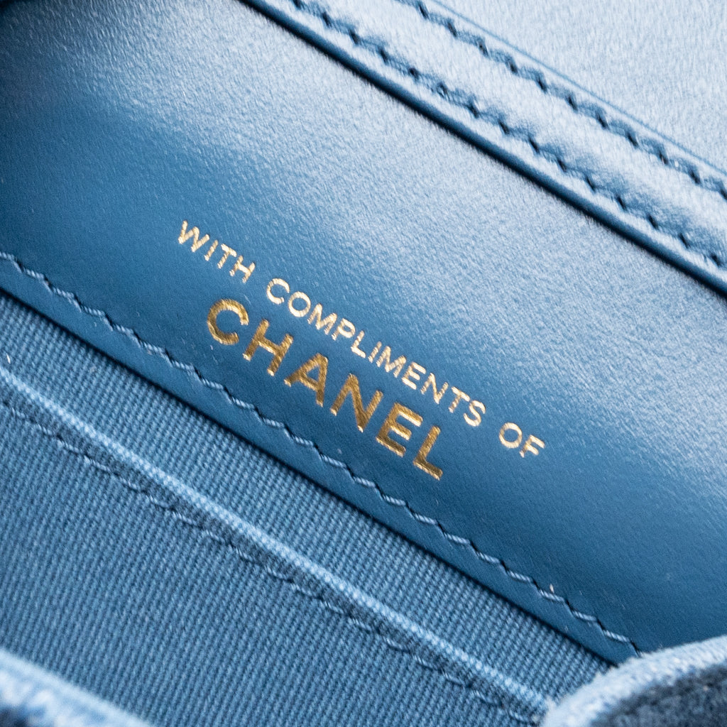 chanel-mini-vertical-flap-clutch-with-chain-denim-blue-ghw