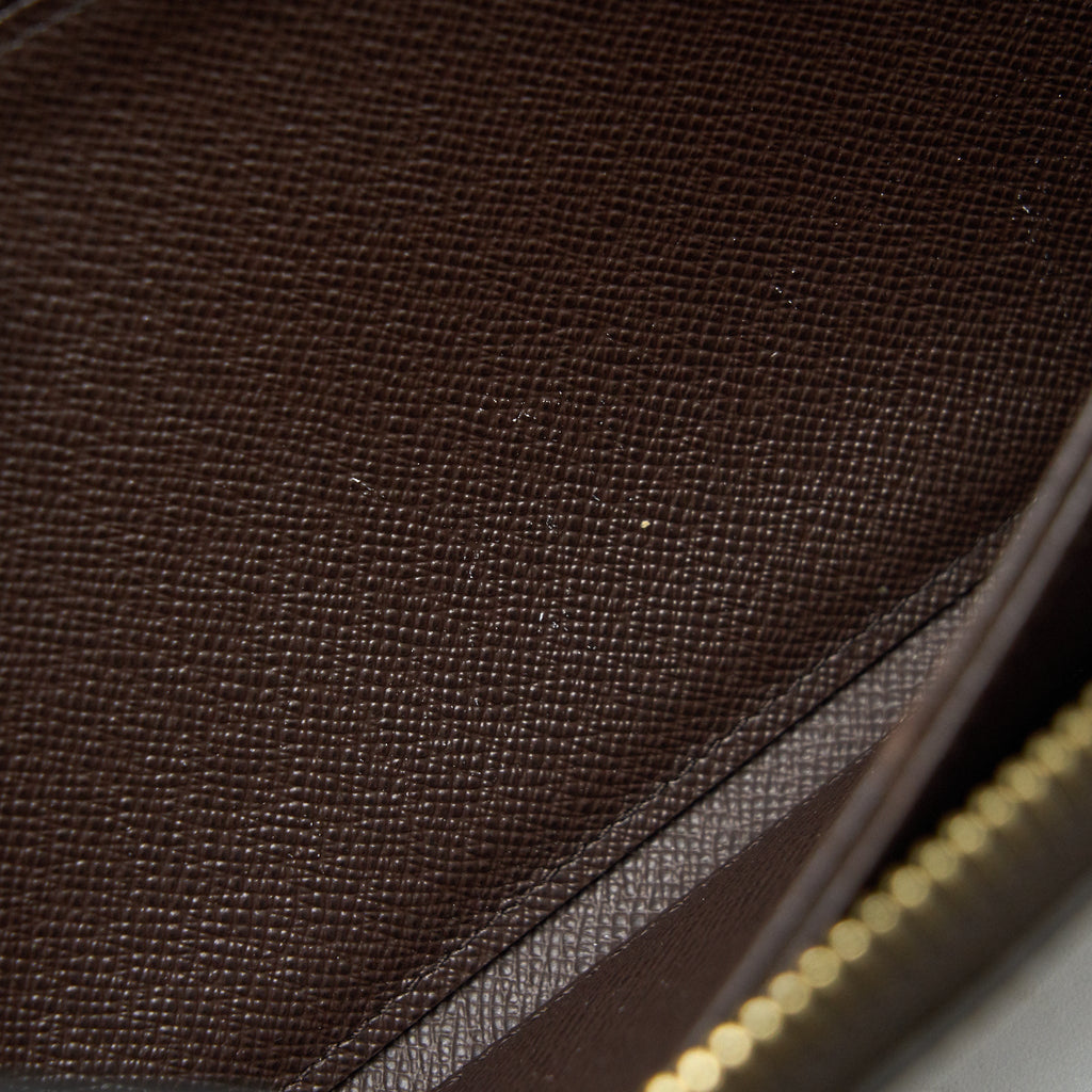 louis-vuitton-zippy-wallet-in-damier-ebene