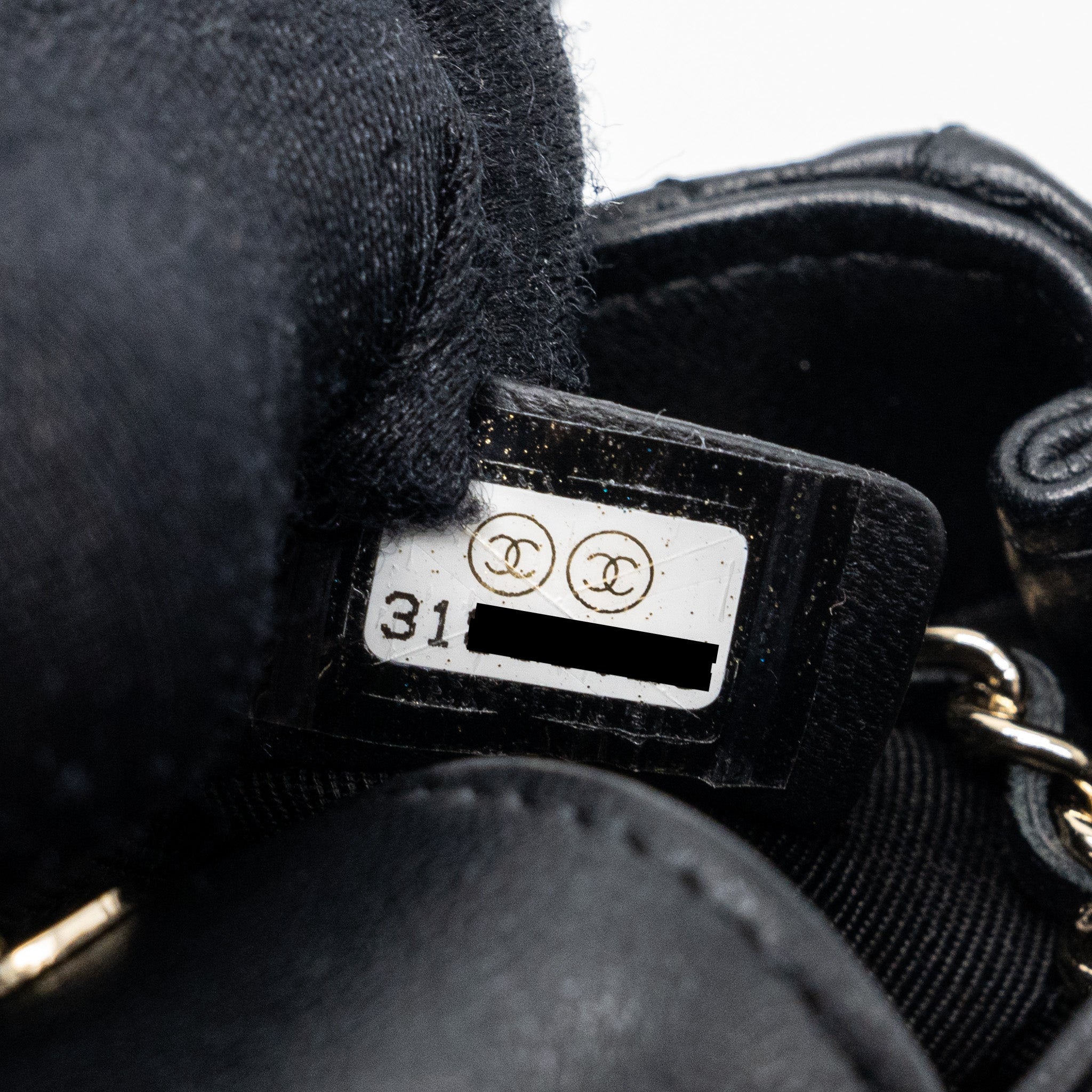 copy-of-chanel-quilted-super-mini-tote-with-chain-lambskin-black-lghw