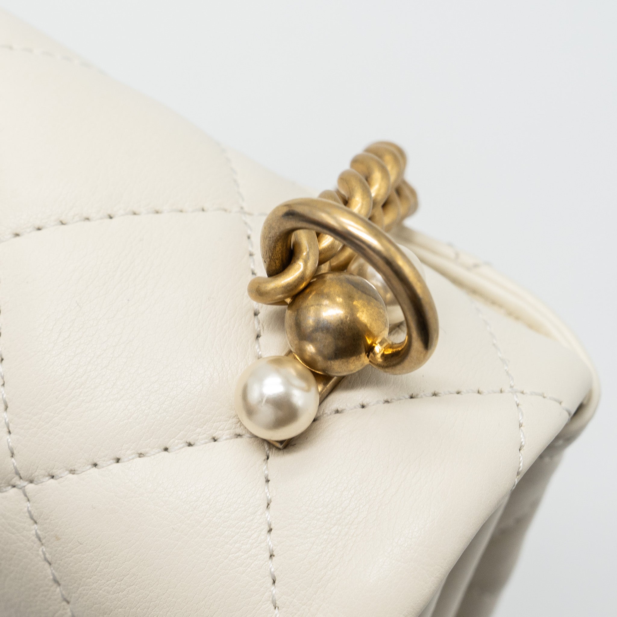 chanel-quilted-mini-flap-bag-lambskin-white-ghw