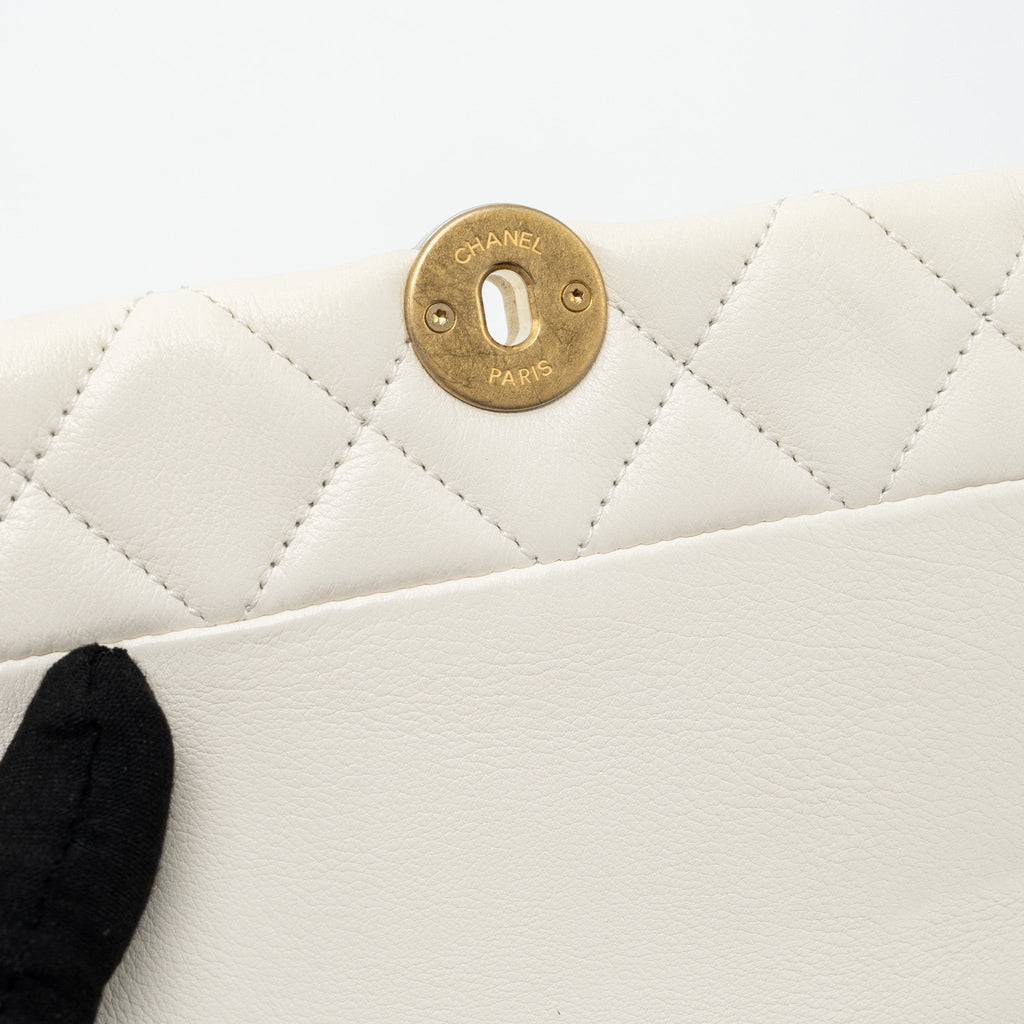 chanel-quilted-mini-flap-bag-lambskin-white-ghw