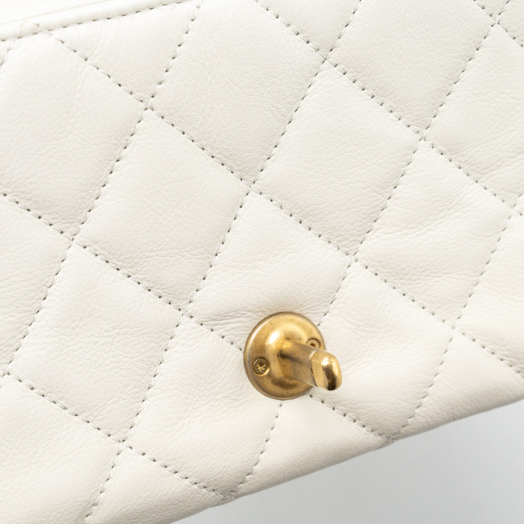 chanel-quilted-mini-flap-bag-lambskin-white-ghw