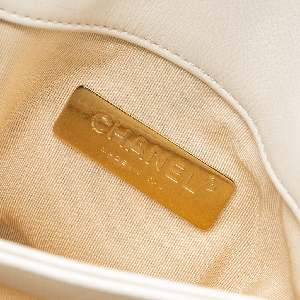 chanel-quilted-mini-flap-bag-lambskin-white-ghw