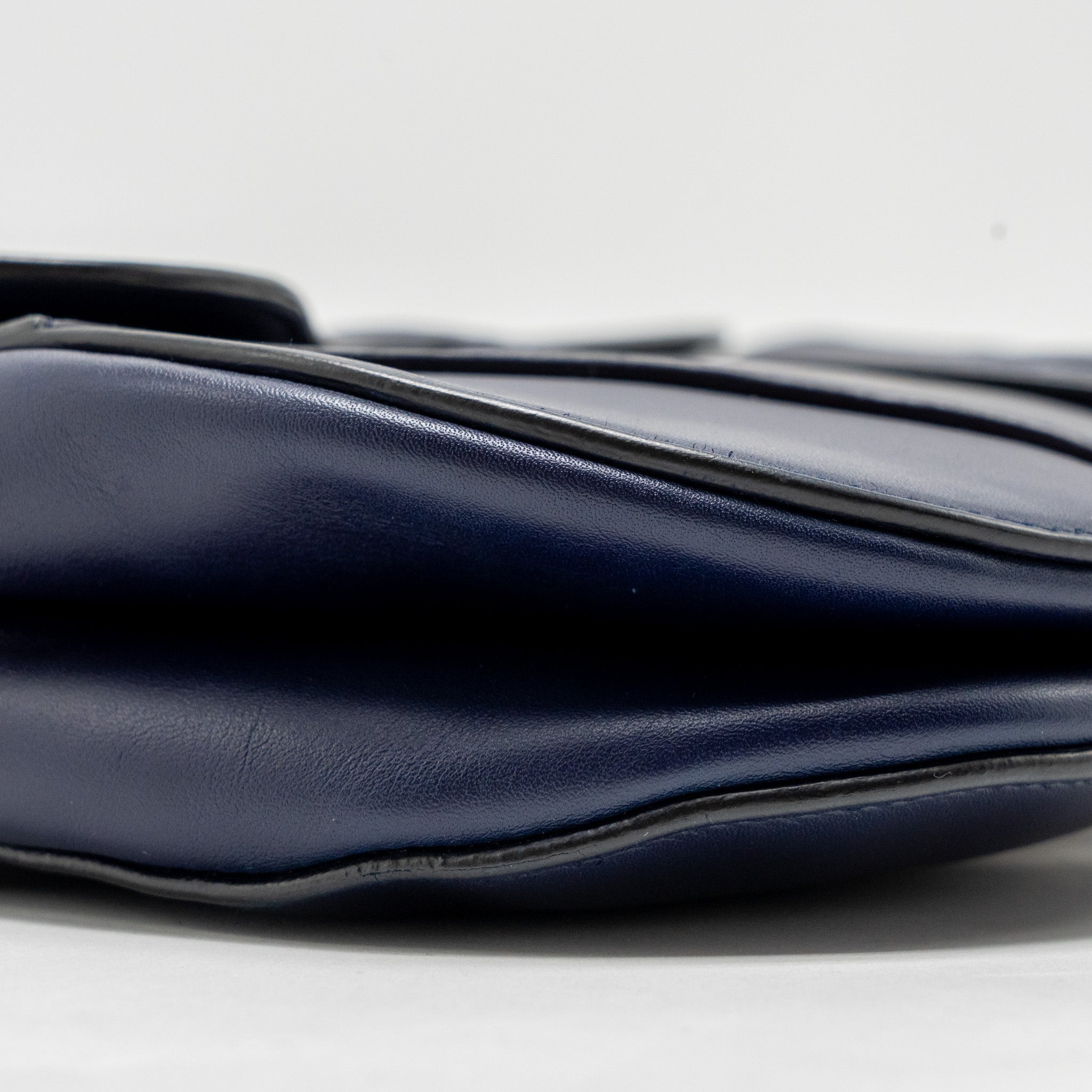 dior-medium-saddle-bag-calfskin-navy-ghw-with-black-oblique-strap
