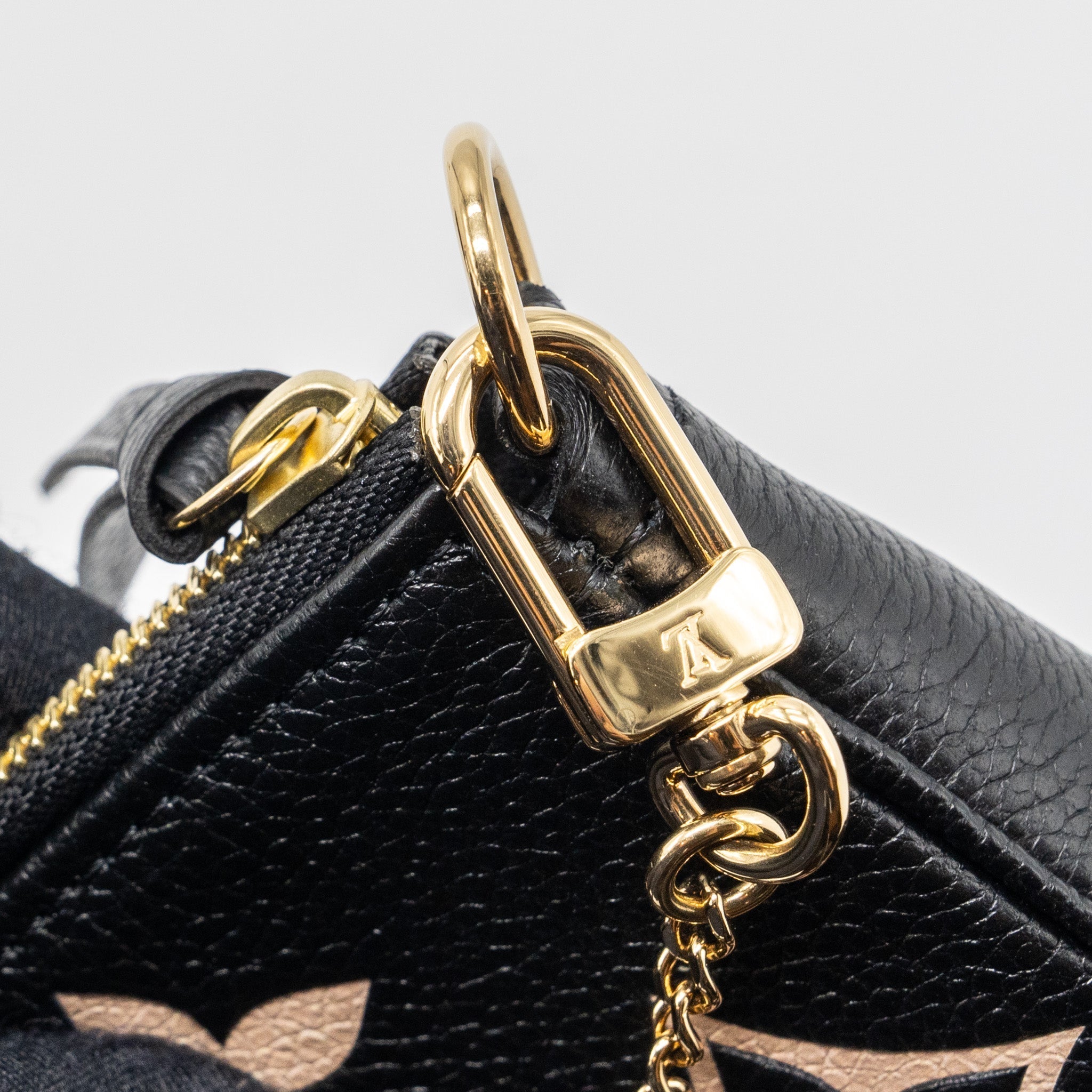 louis-vuitton-mini-pochette-accessories-monogram-empreinte-leather-black-beige-ghw