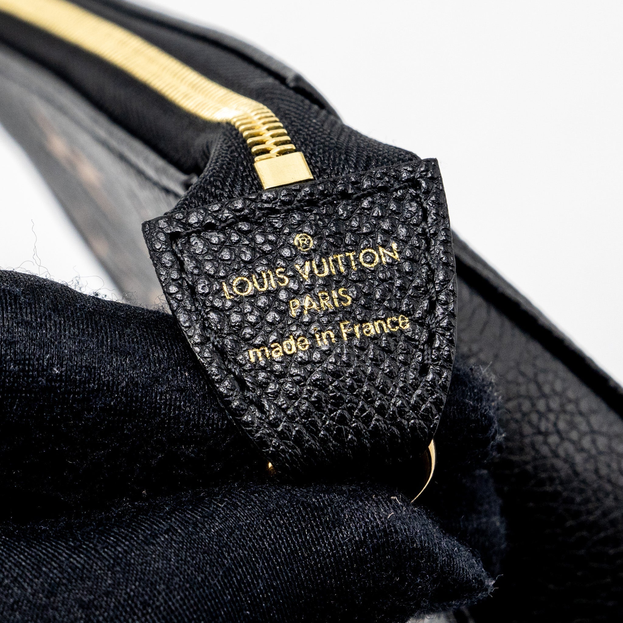 louis-vuitton-mini-pochette-accessories-monogram-empreinte-leather-black-beige-ghw