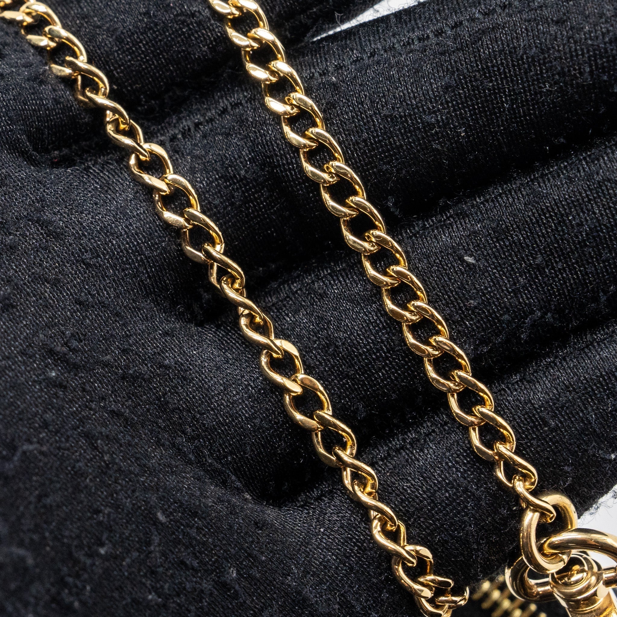 louis-vuitton-mini-pochette-accessories-monogram-empreinte-leather-black-beige-ghw