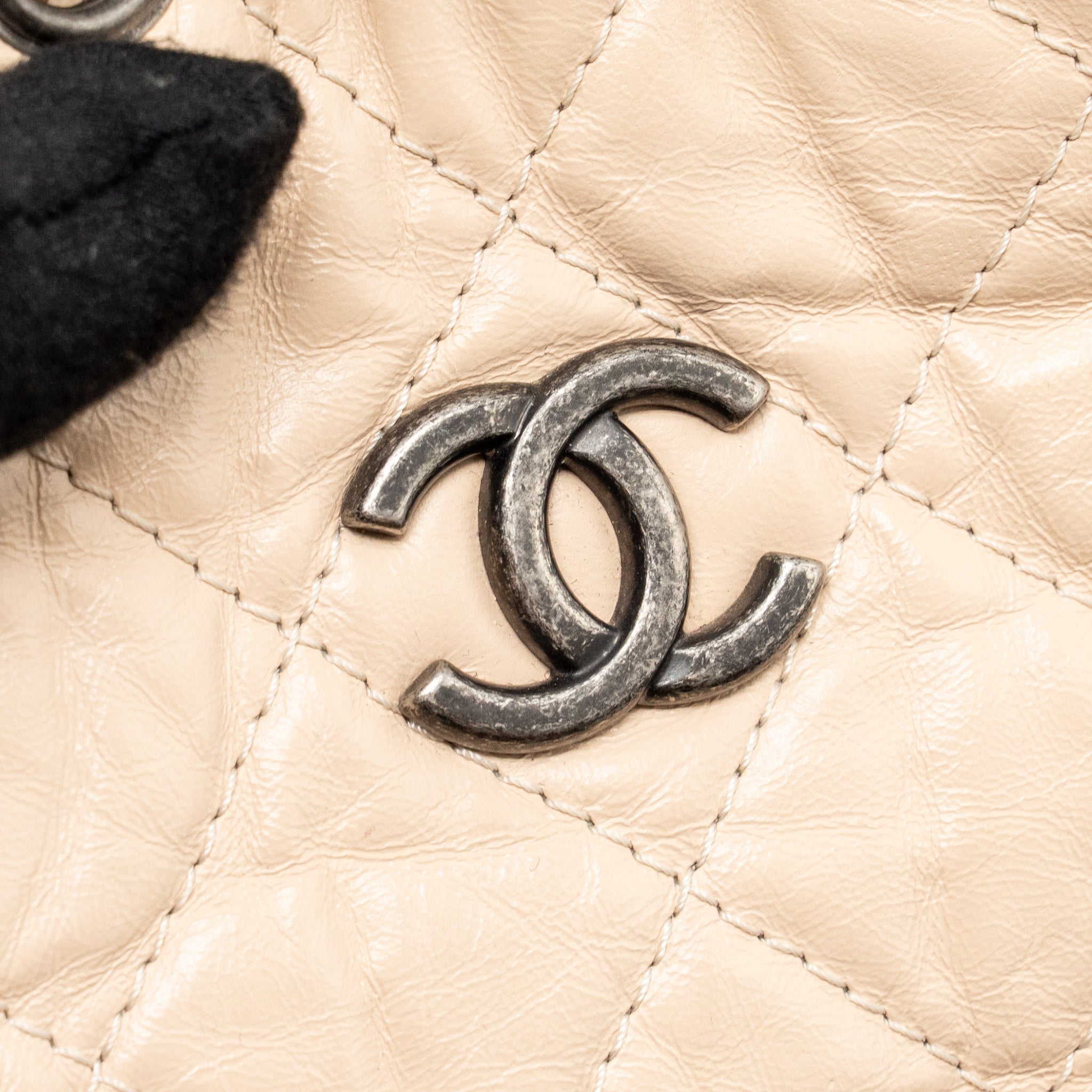 chanel-small-gabrielle-backpack-aged-calfskin-beige-black-multicolour-hardware-1