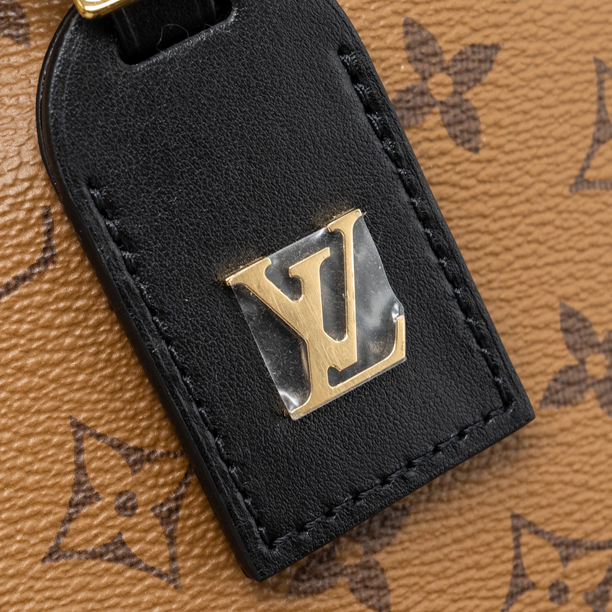 louis-vuitton-atlantis-bb-monogram-reverse-canvas-ghw