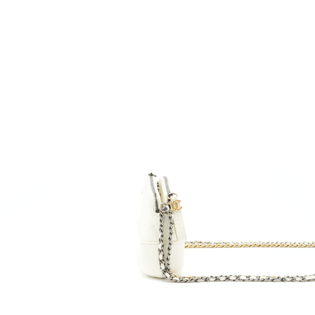 chanel-gabrielle-clutch-on-chain-aged-calfskin-white-with-silver-and-gold-hardware