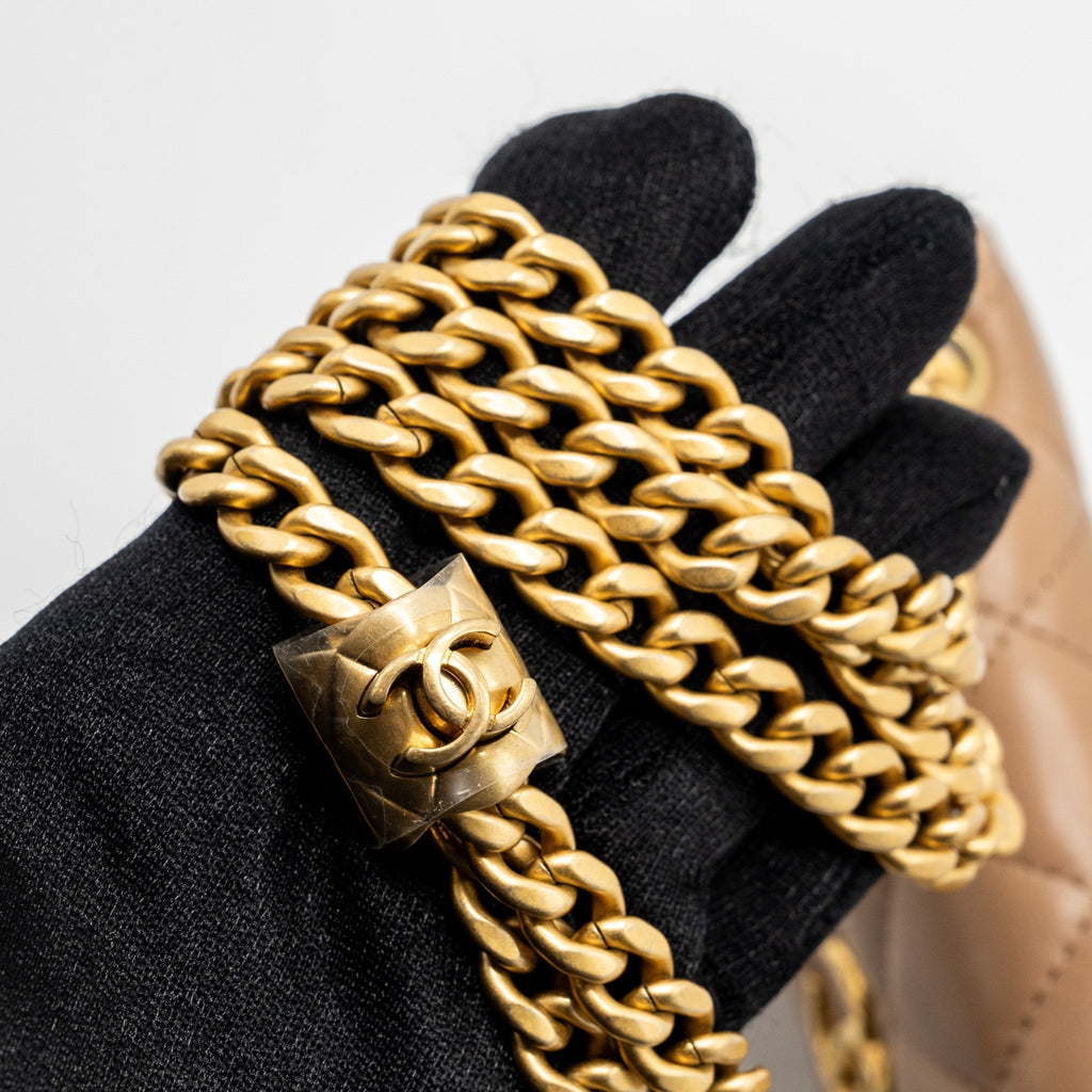 chanel-22k-gold-pillar-mini-flap-bag-lambskin-dark-beige-ghw-microchip