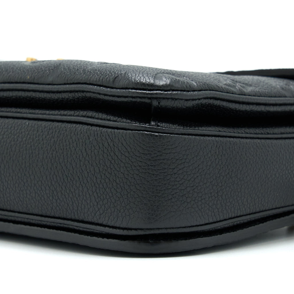 louis-vuitton-pochette-metis-monogram-empreinte-black-ghw-1