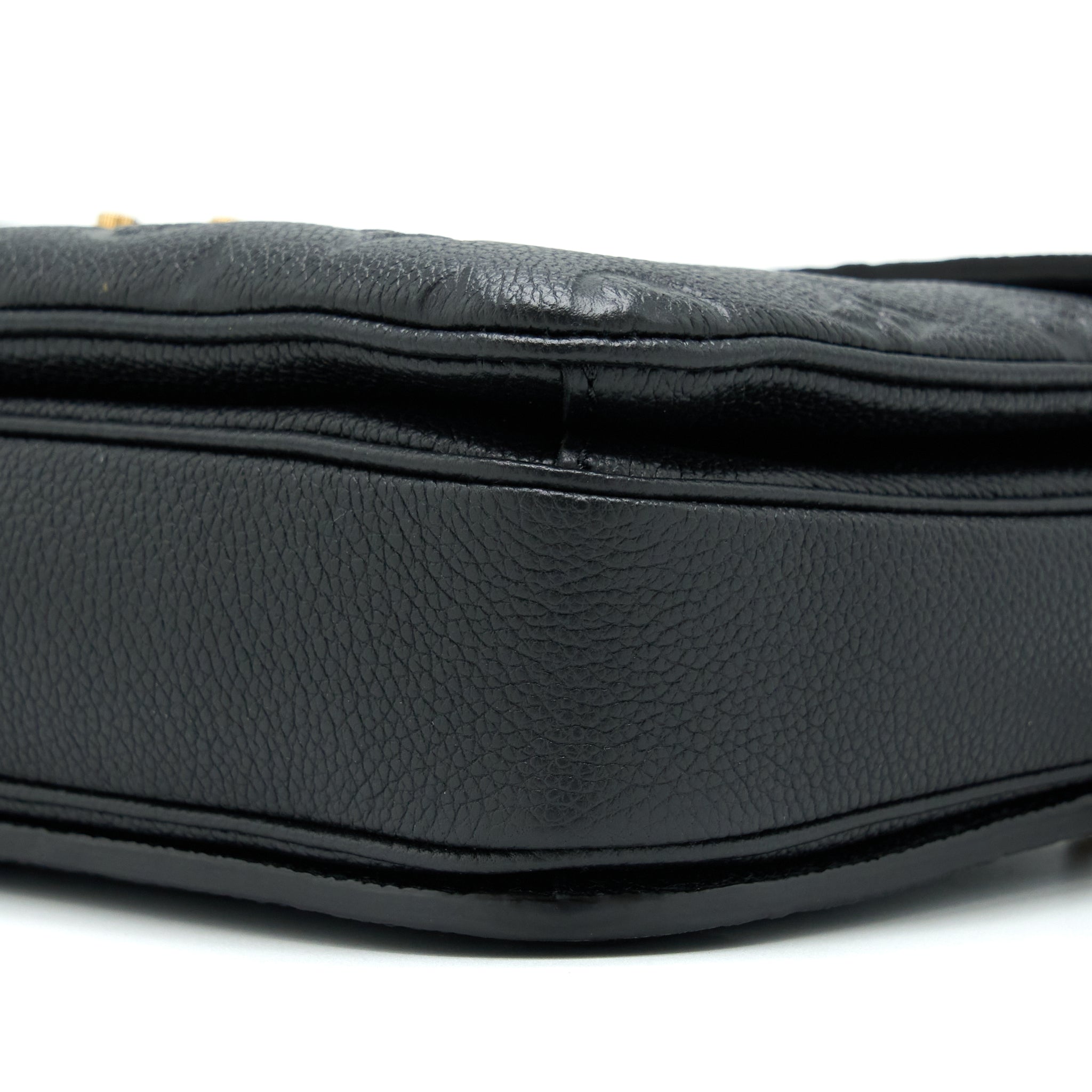 louis-vuitton-pochette-metis-monogram-empreinte-black-ghw-1