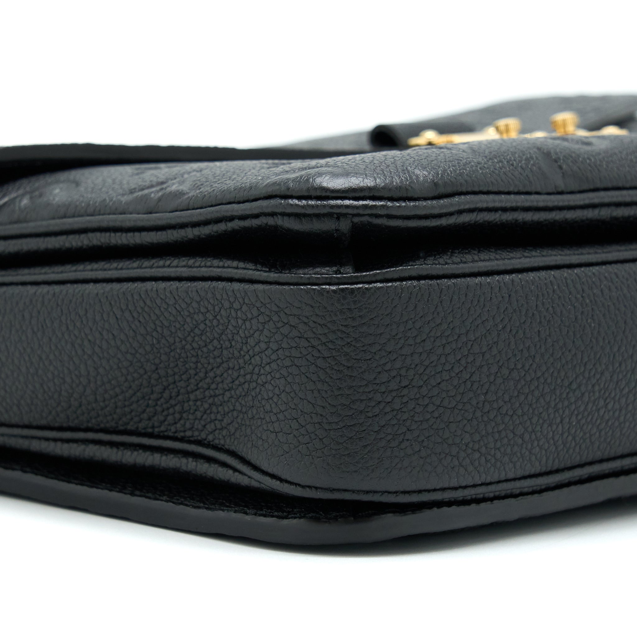 louis-vuitton-pochette-metis-monogram-empreinte-black-ghw-1
