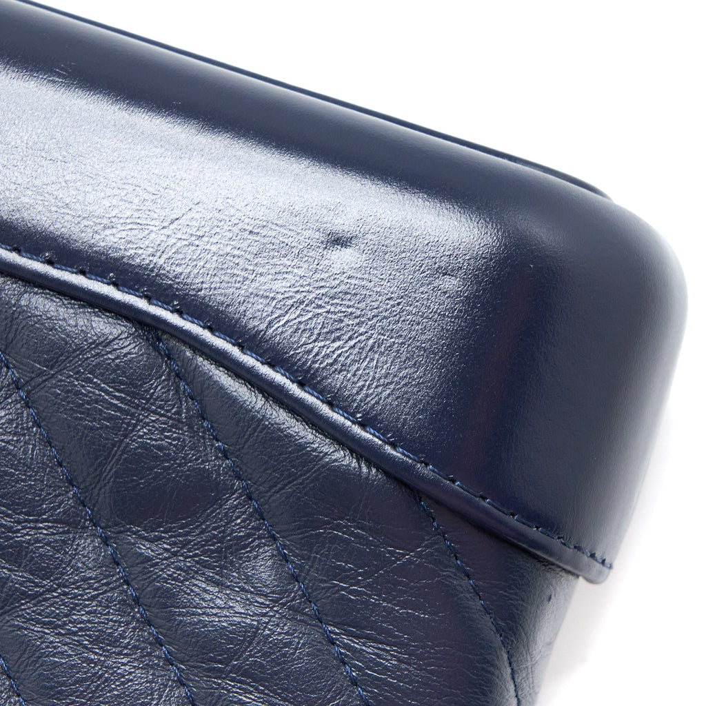chanel-gabrielle-clutch-on-chain-aged-calfskim-navy-shw