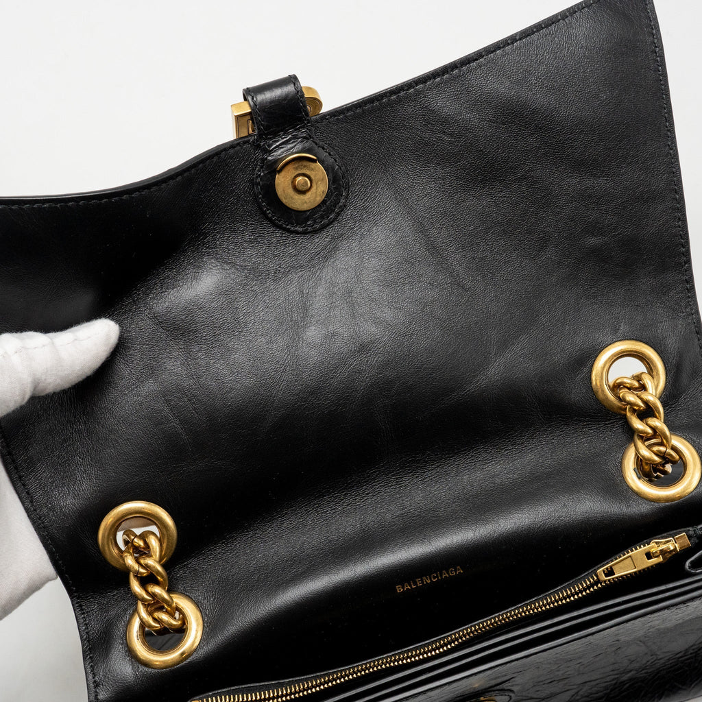balenciaga-medium-women-s-crush-chain-bag-calfskin-black-ghw