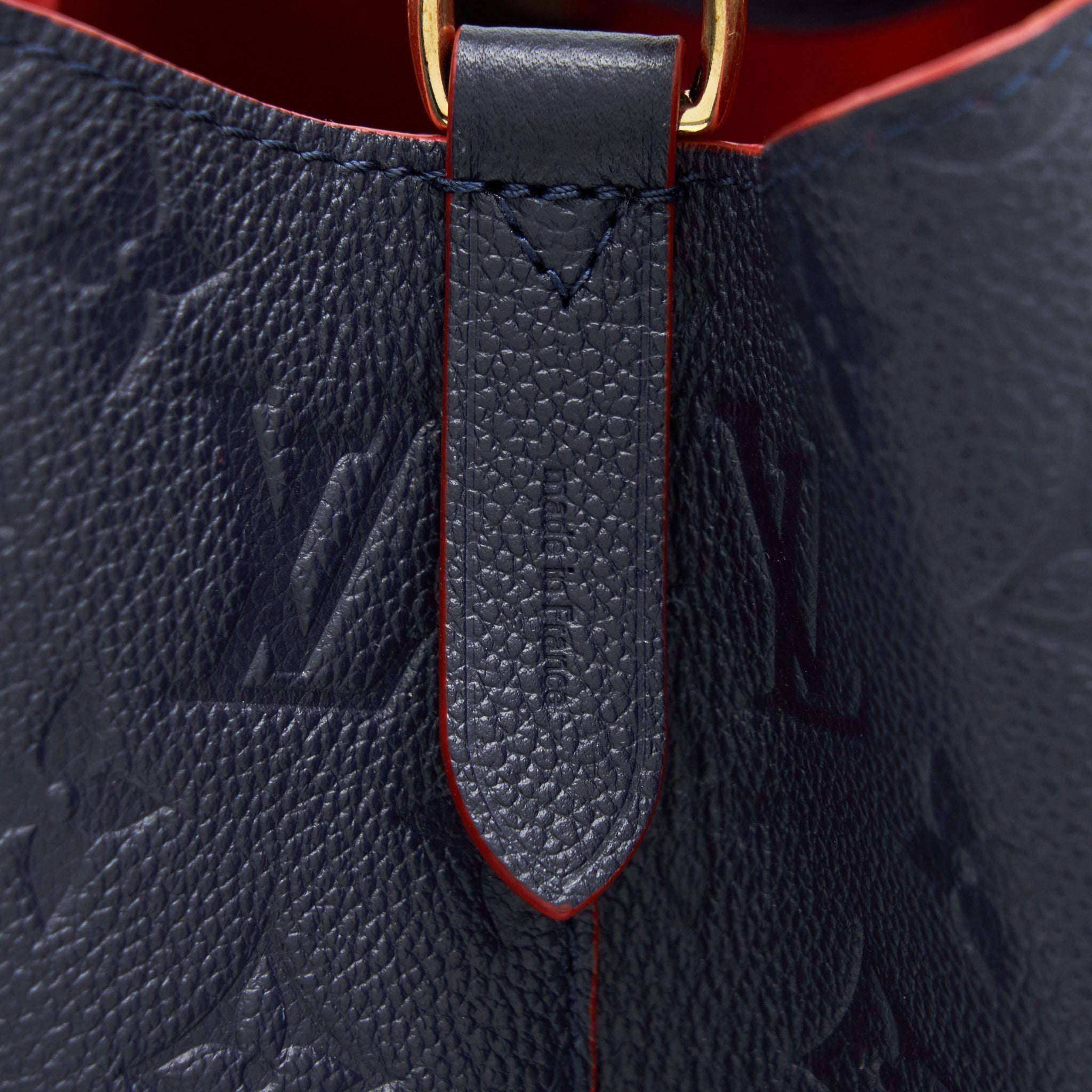 louis-vuitton-neonoe-monogram-empreinte-marine-rouge-ghw