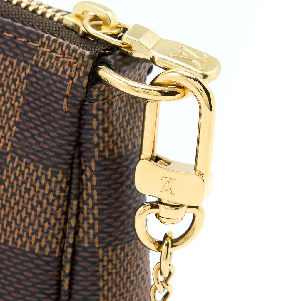 louis-vuitton-mini-pochette-accessories-damier-ebene-ghw