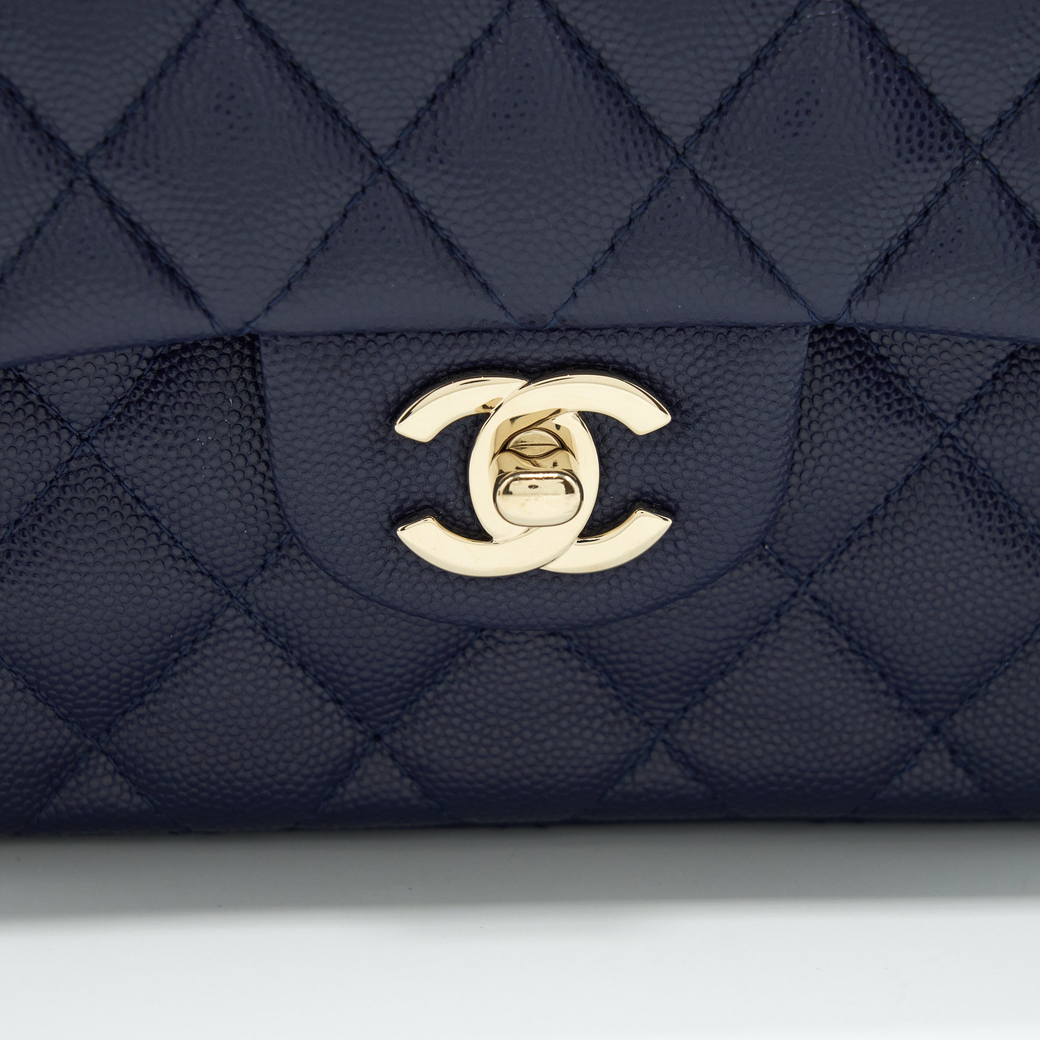 chanel-small-classic-flap-bag-caviar-dark-blue-lghw