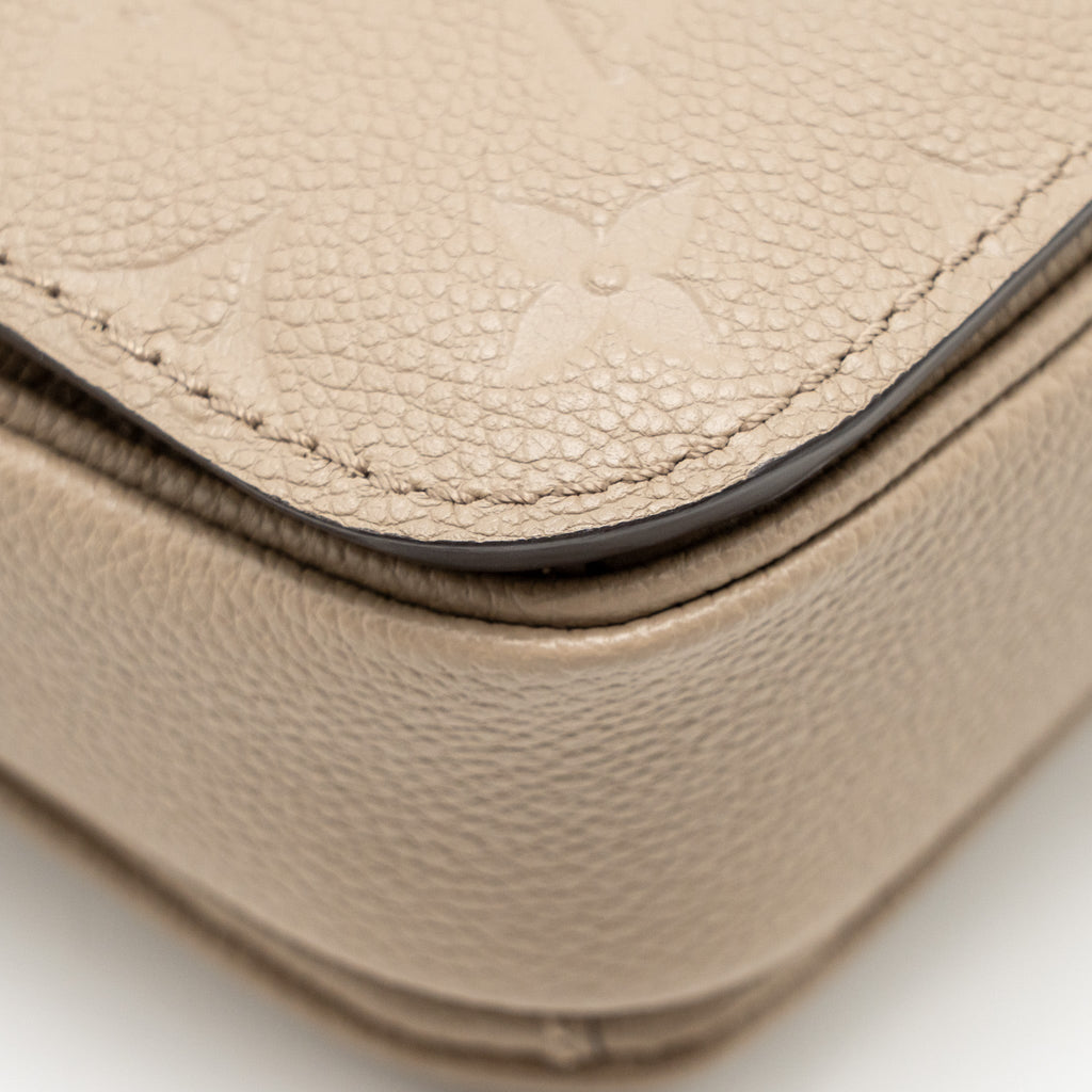 louis-vuitton-pochette-metis-monogram-empreinte-tourterelle-ghw