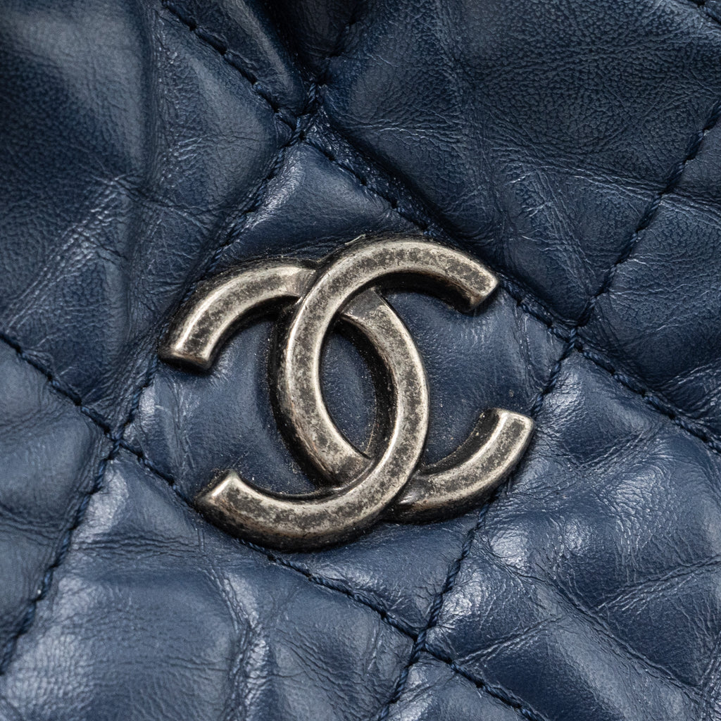 chanel-small-gabrielle-backpack-aged-calfskin-navy-blue-black-ruthenium-hardware