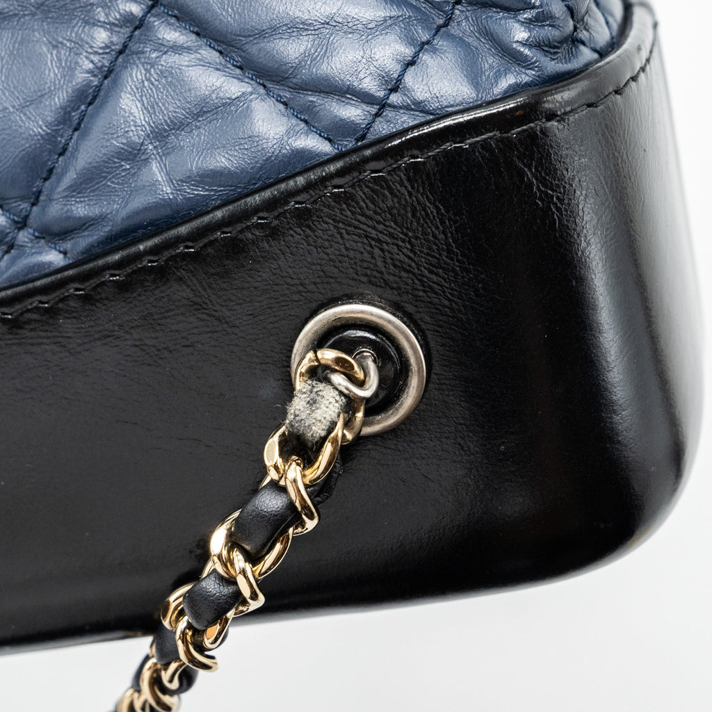 chanel-small-gabrielle-backpack-aged-calfskin-navy-blue-black-ruthenium-hardware