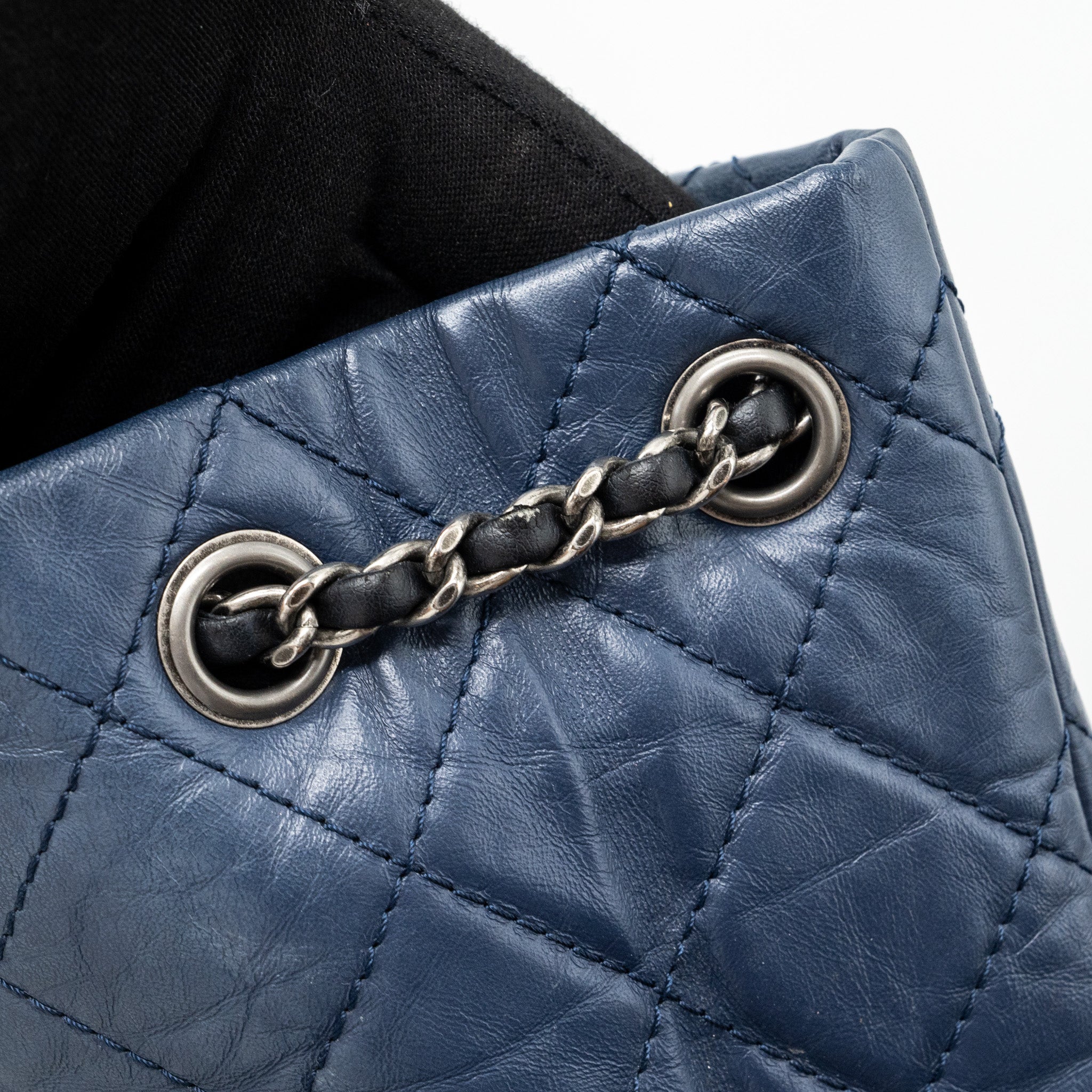 chanel-small-gabrielle-backpack-aged-calfskin-navy-blue-black-ruthenium-hardware