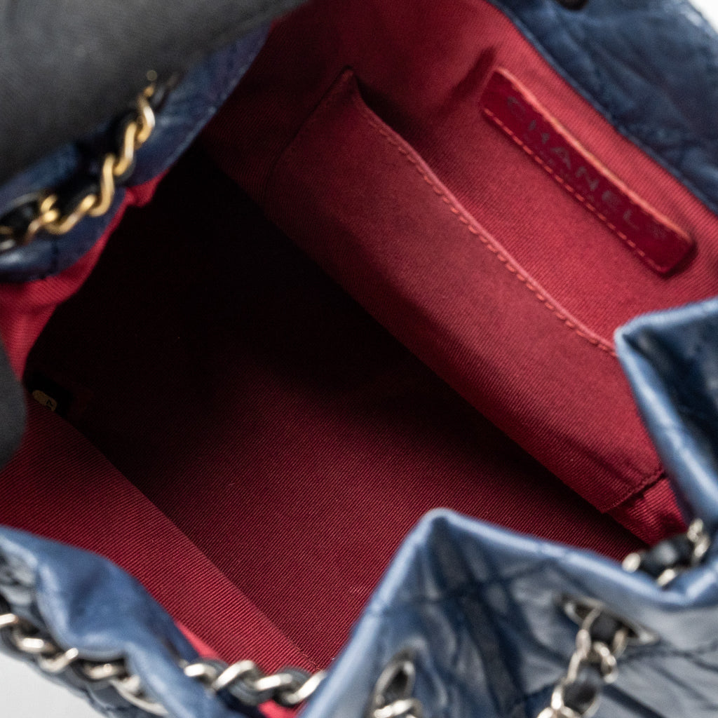 chanel-small-gabrielle-backpack-aged-calfskin-navy-blue-black-ruthenium-hardware
