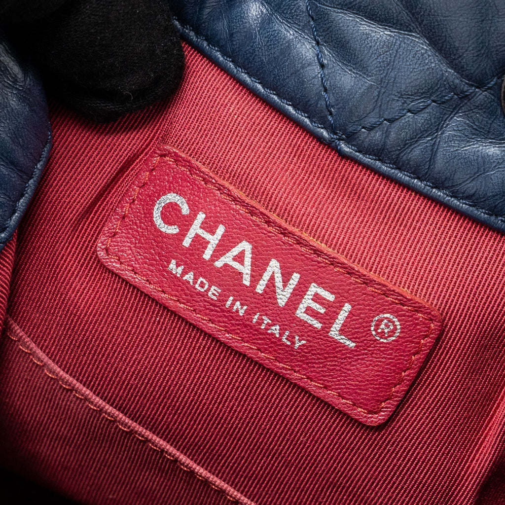 chanel-small-gabrielle-backpack-aged-calfskin-navy-blue-black-ruthenium-hardware