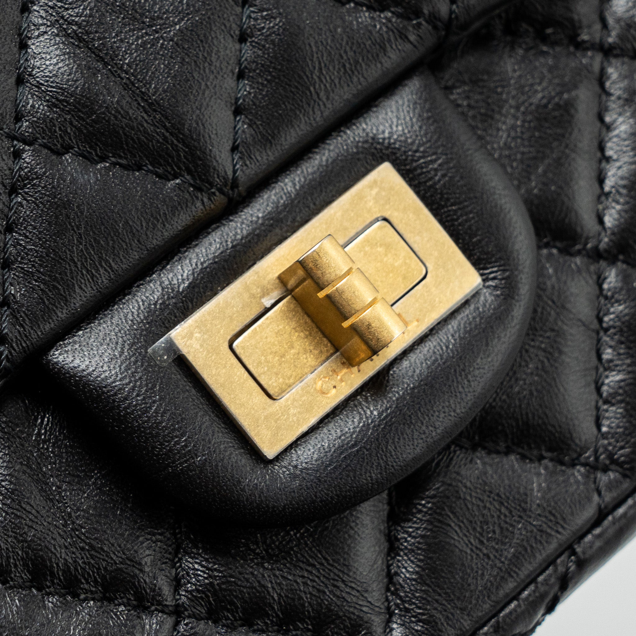 chanel-mini-2-55-reissue-flap-bag-aged-calfskin-black-brushed-ghw