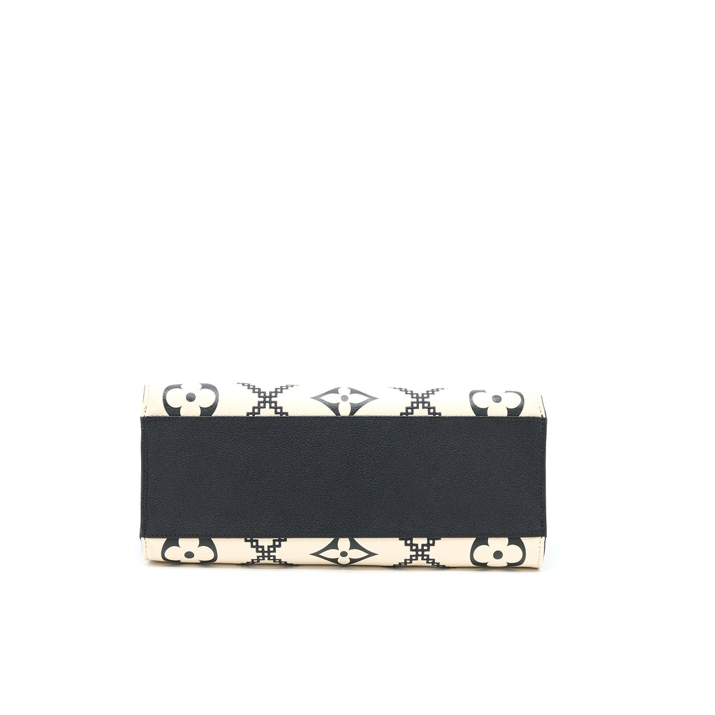 louis-vuitton-onthego-mm-empreinte-cream-black-ghw-new-version