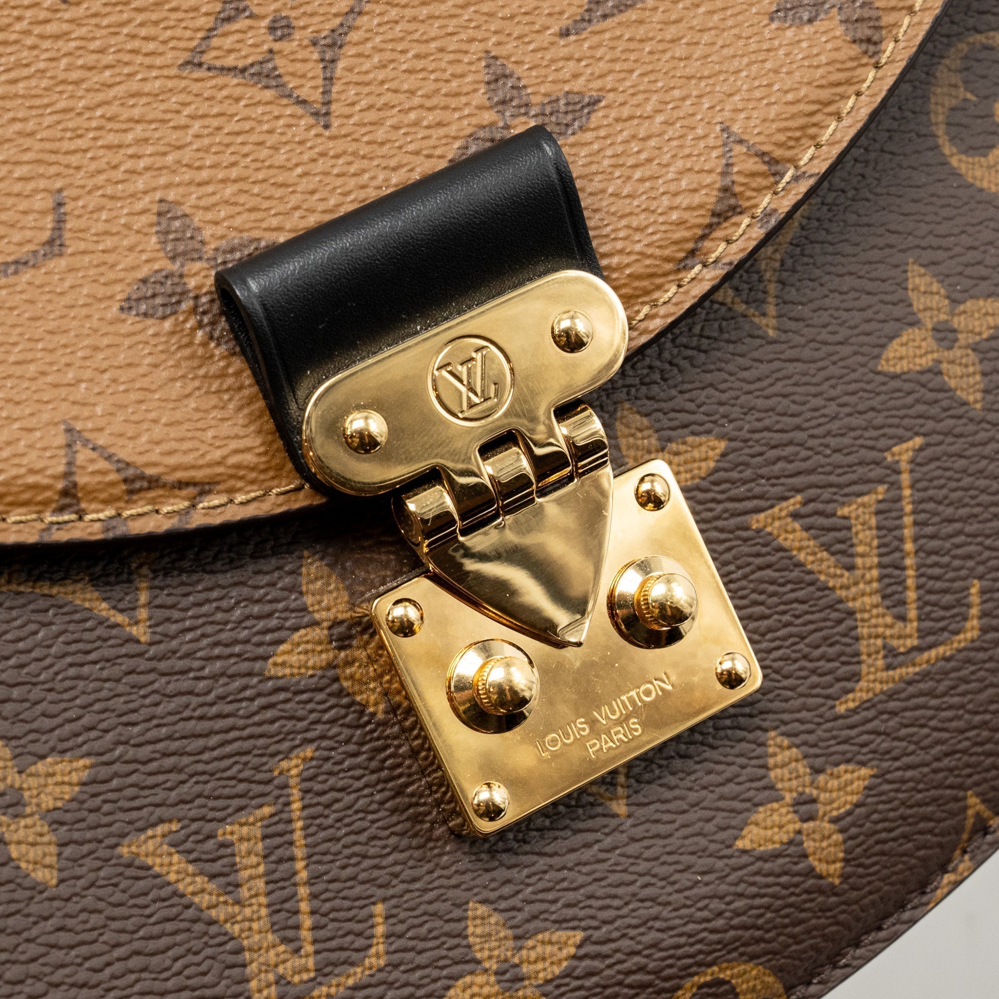 louis-vuitton-tilsitt-monogram-reverse-canvas-ghw