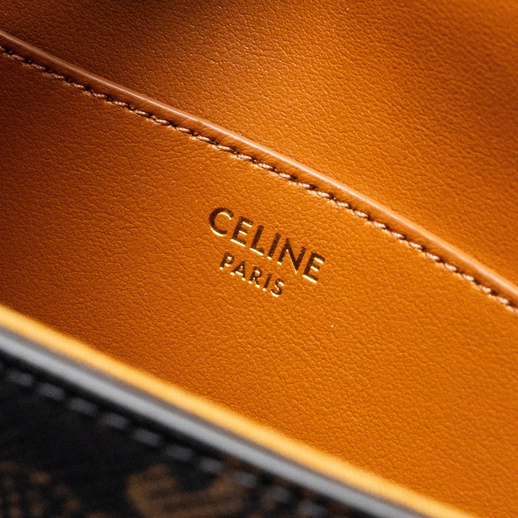 celine-clutch-on-strap-tabou-in-triomphe-canvas-calfskin-tan-ghw