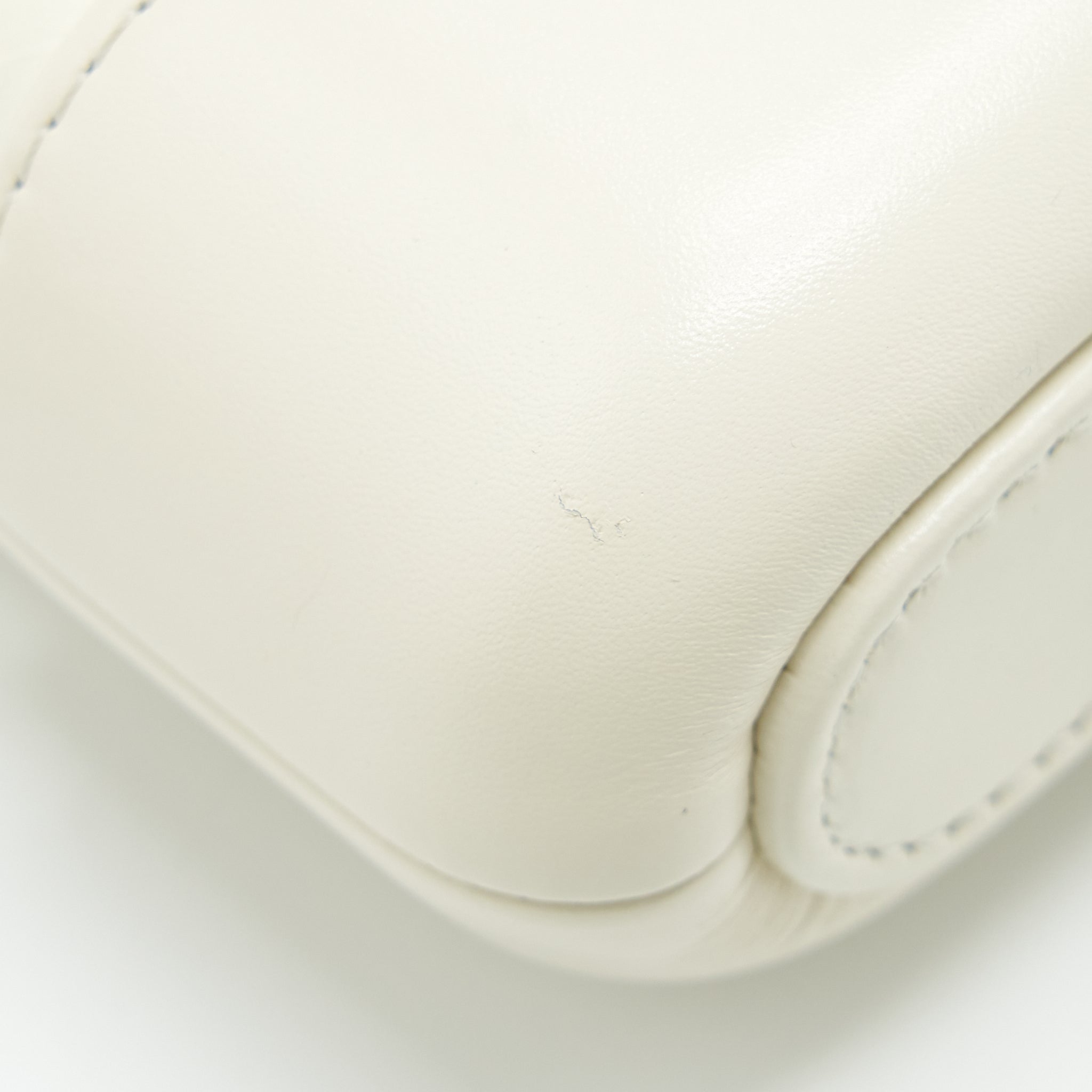 chanel-gabrielle-clutch-on-chain-aged-calfskin-white-with-silver-and-gold-hardware