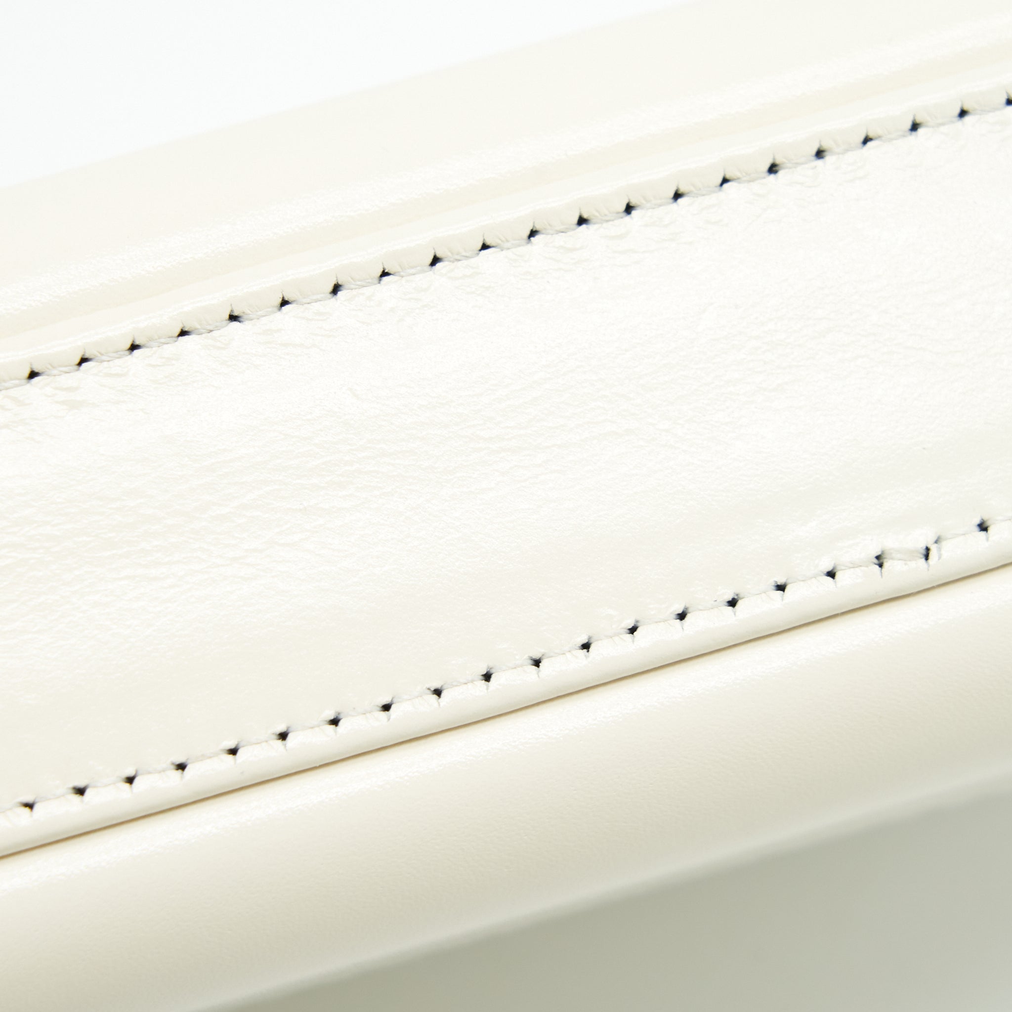 chanel-gabrielle-clutch-on-chain-aged-calfskin-white-with-silver-and-gold-hardware