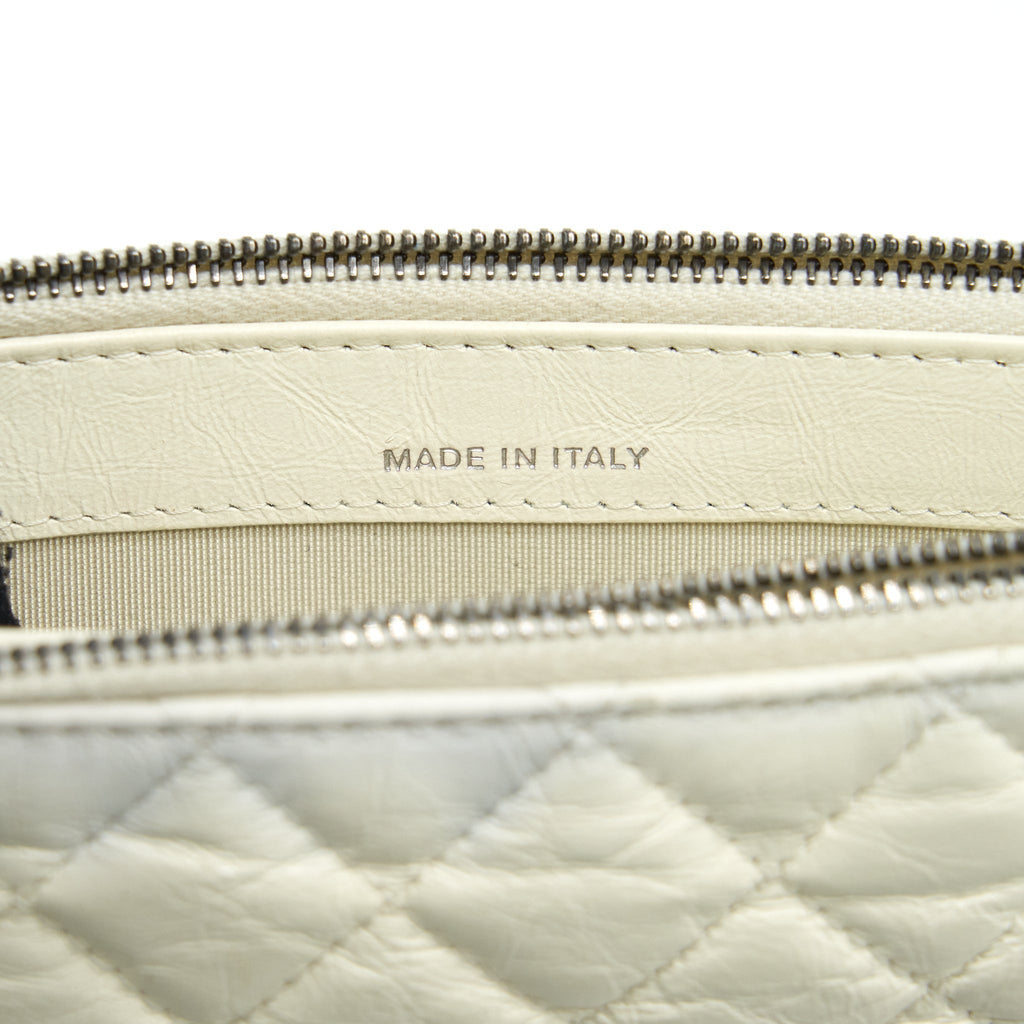 chanel-gabrielle-clutch-on-chain-aged-calfskin-white-with-silver-and-gold-hardware