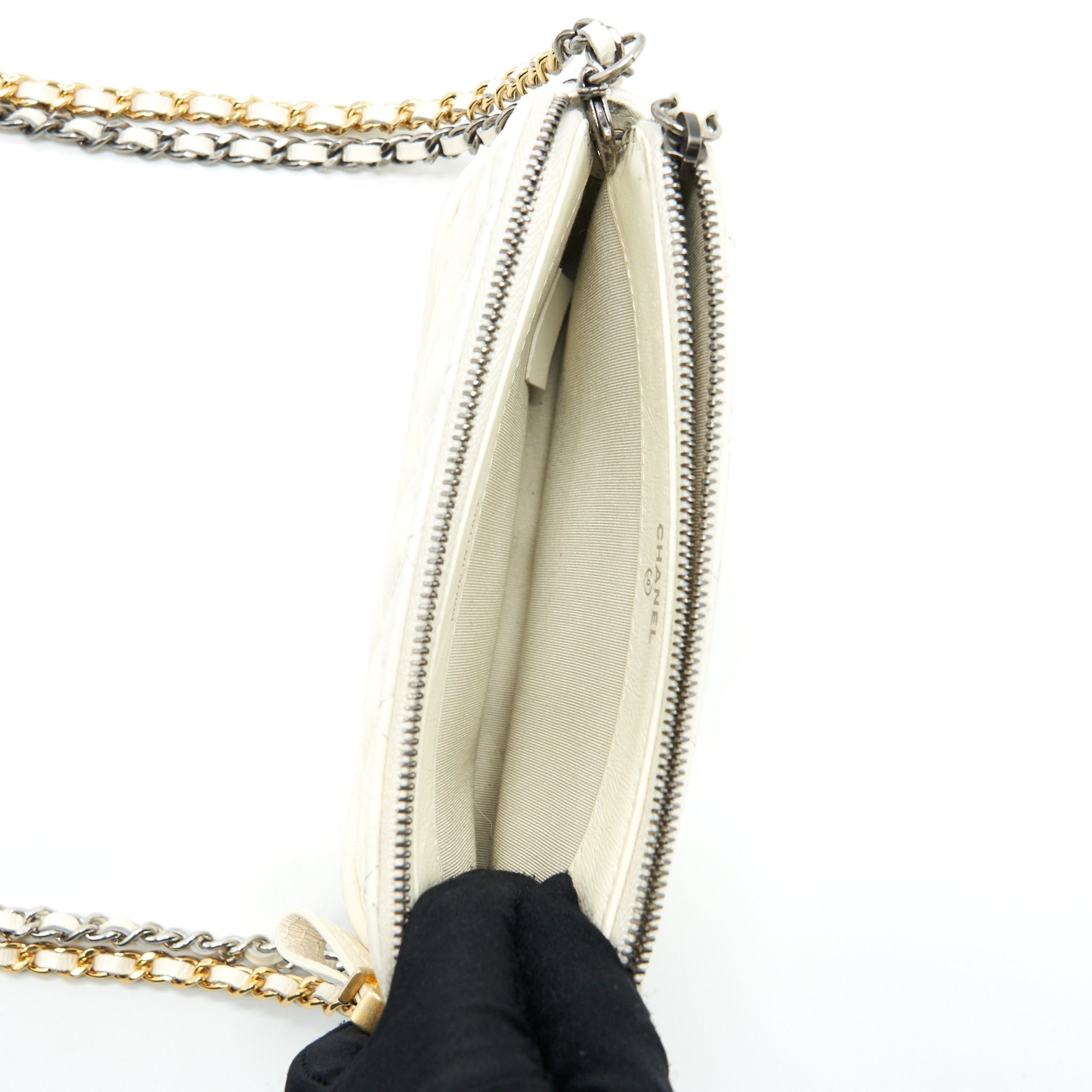 chanel-gabrielle-clutch-on-chain-aged-calfskin-white-with-silver-and-gold-hardware