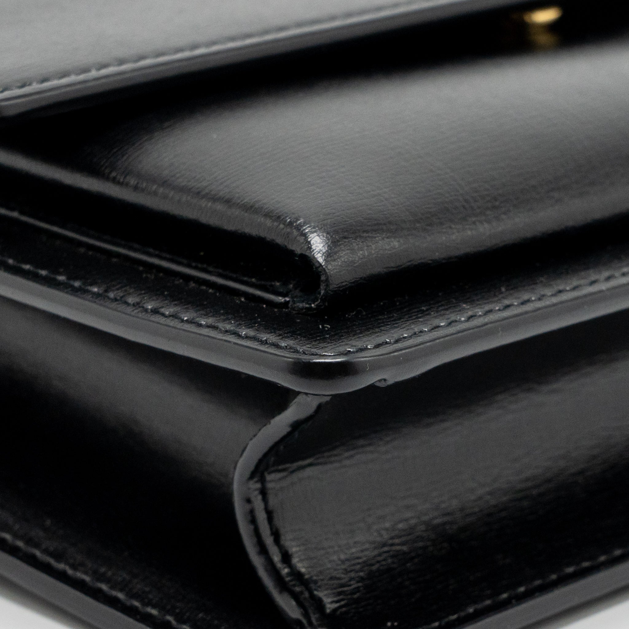 saint-laurent-ysl-medium-top-handle-sunset-bag-calfskin-black-ghw