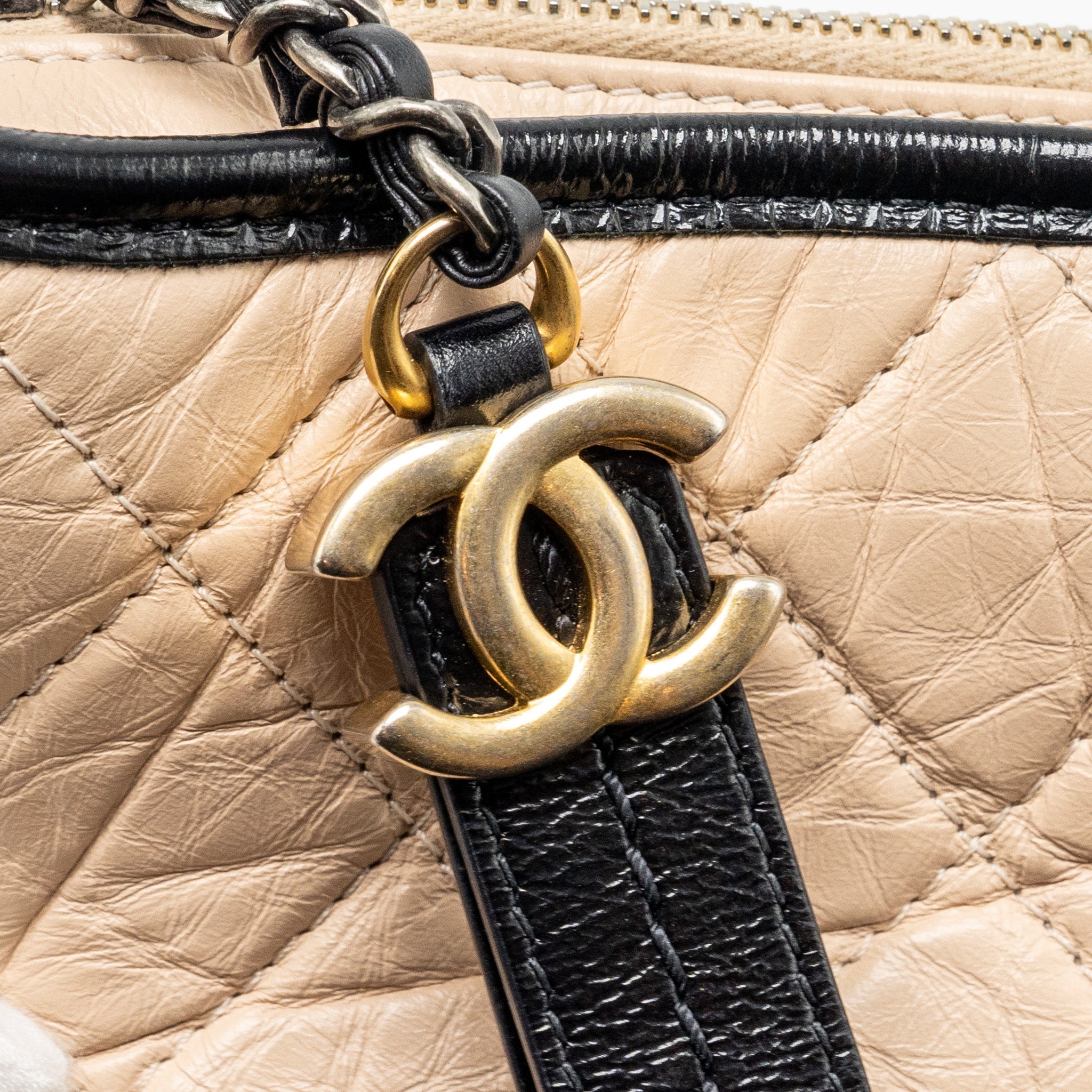 chanel-small-gabrielle-hobo-bag-aged-calfskin-beige-black-multicoloured-hardware