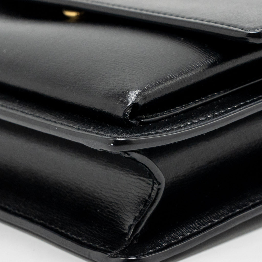 saint-laurent-ysl-medium-top-handle-sunset-bag-calfskin-black-ghw